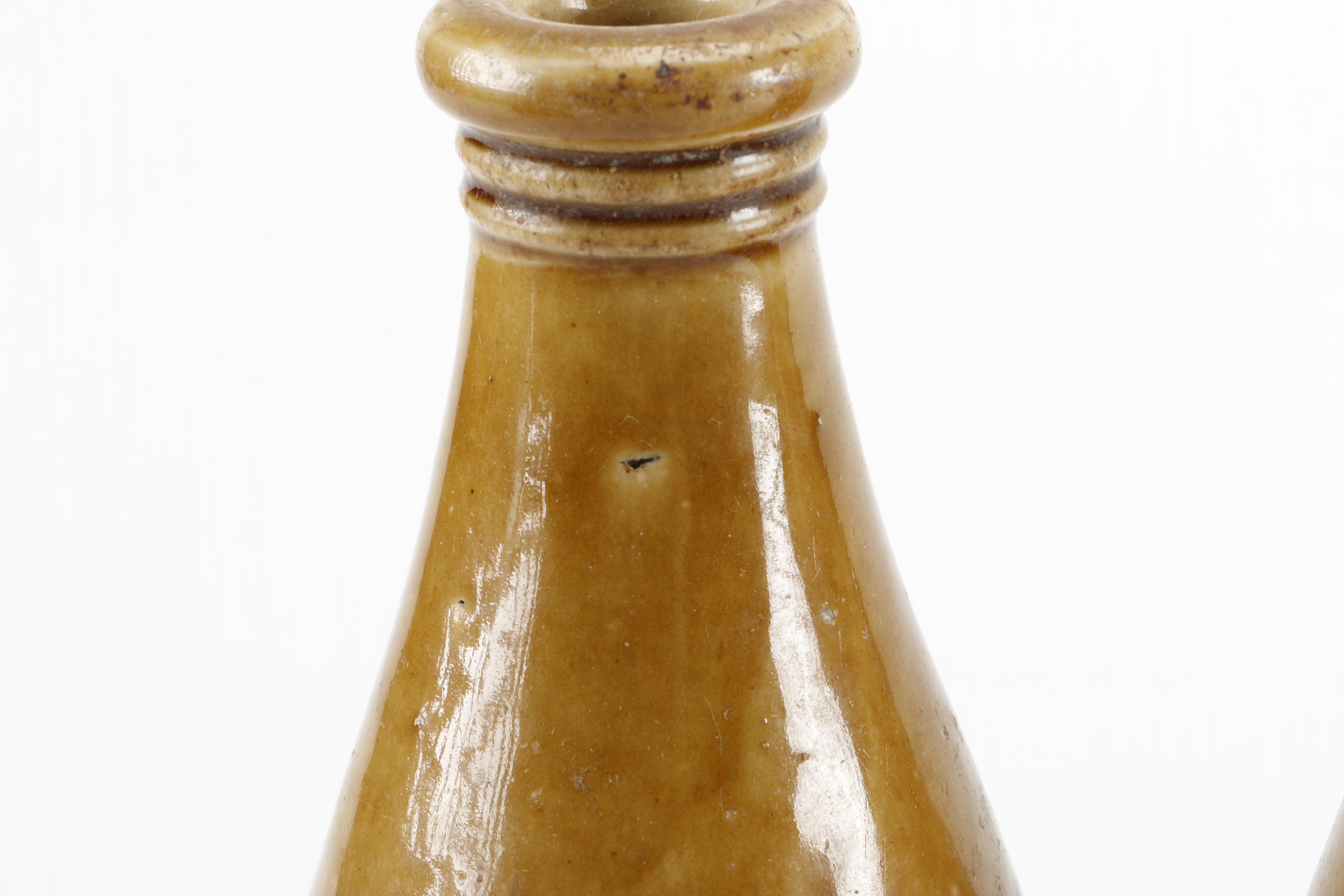 Collection of Vintage Stoneware Crocks Including Erven Lucas Bols