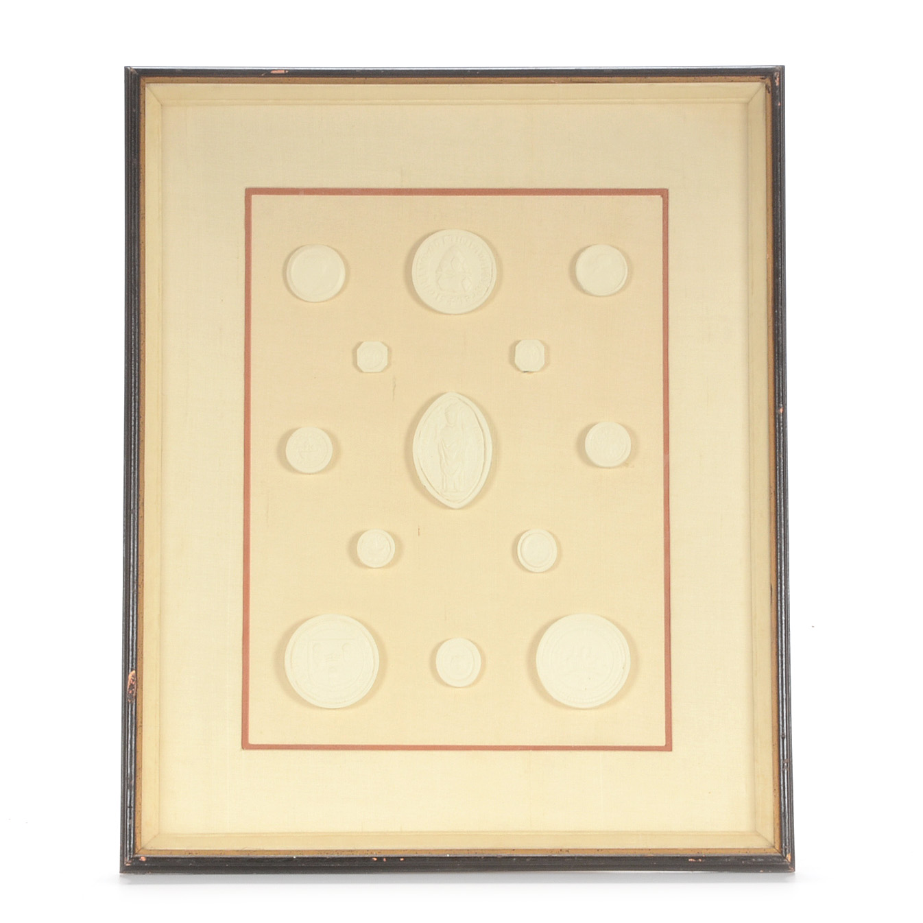 Framed Display of Plaster Intaglio Molds After Medieval Seals