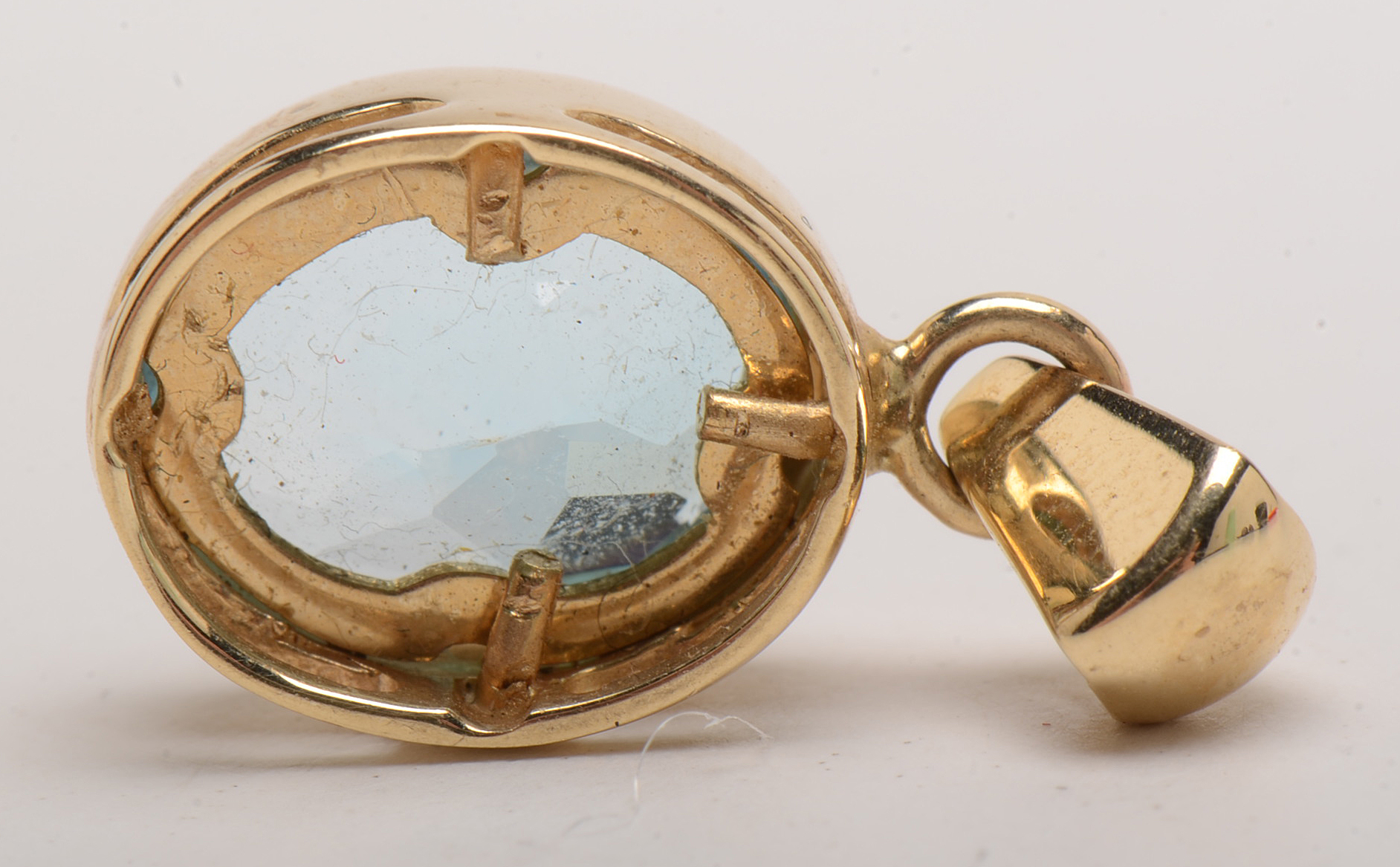 14K Yellow Gold Blue Topaz Pendant