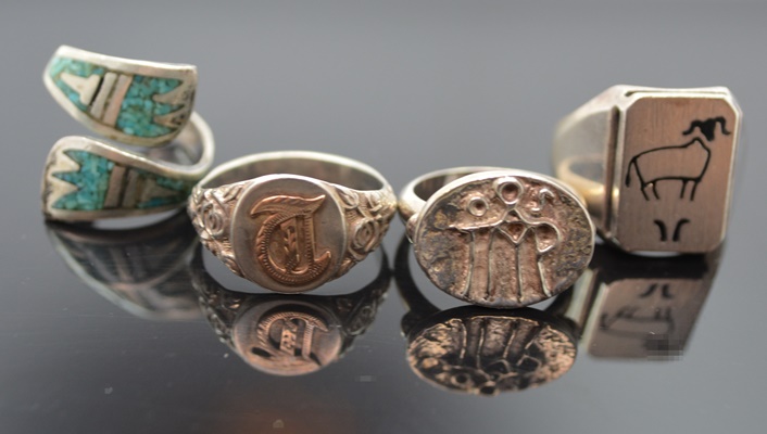 Four Sterling Silver Rings
