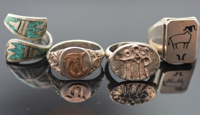 Four Sterling Silver Rings