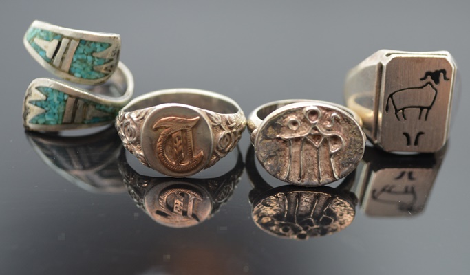 Four Sterling Silver Rings