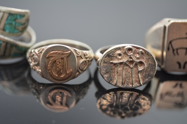 Four Sterling Silver Rings