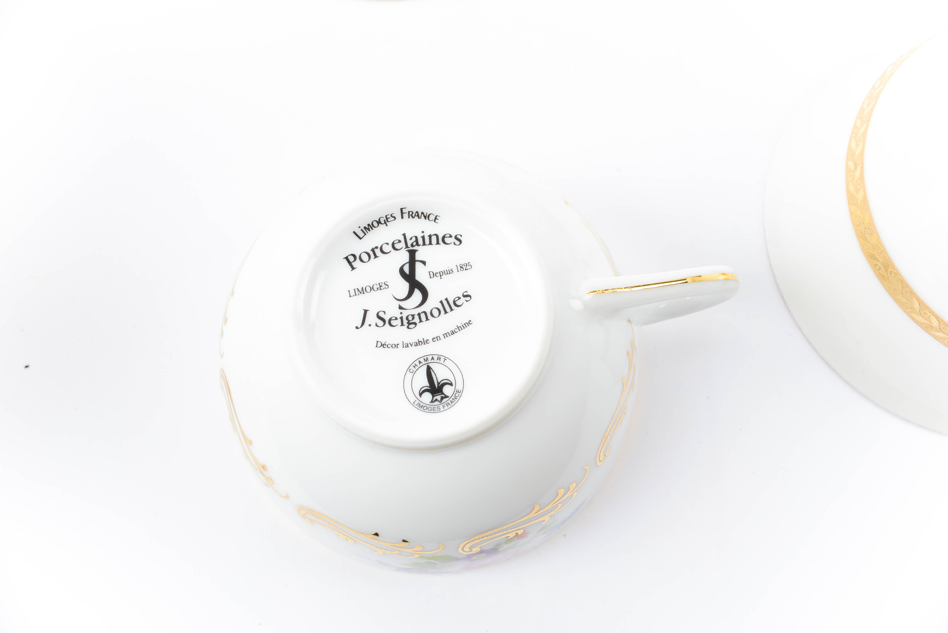 Assortment of Teacups and Matching Saucers