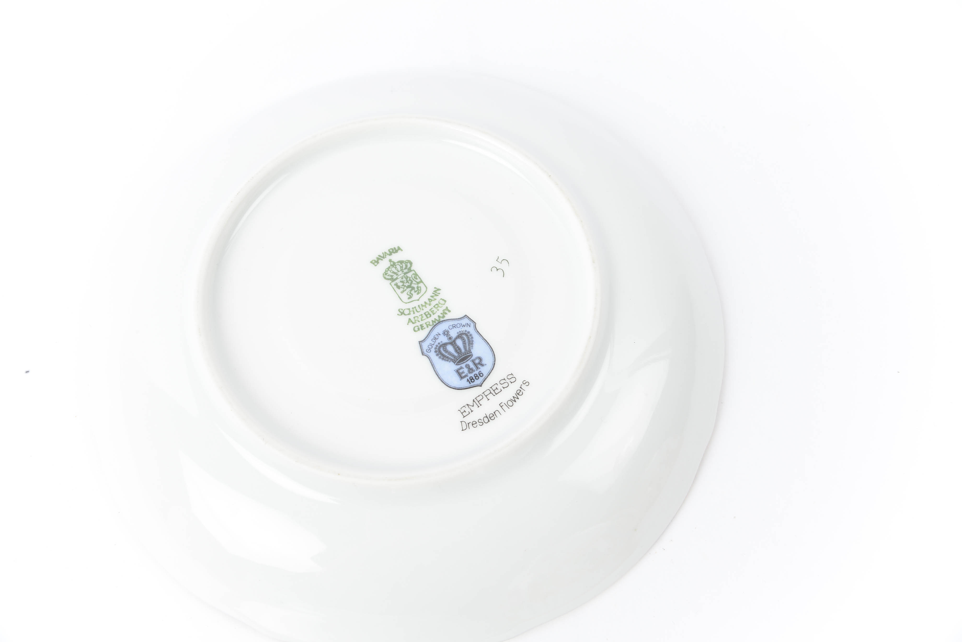 Assortment of Teacups and Matching Saucers