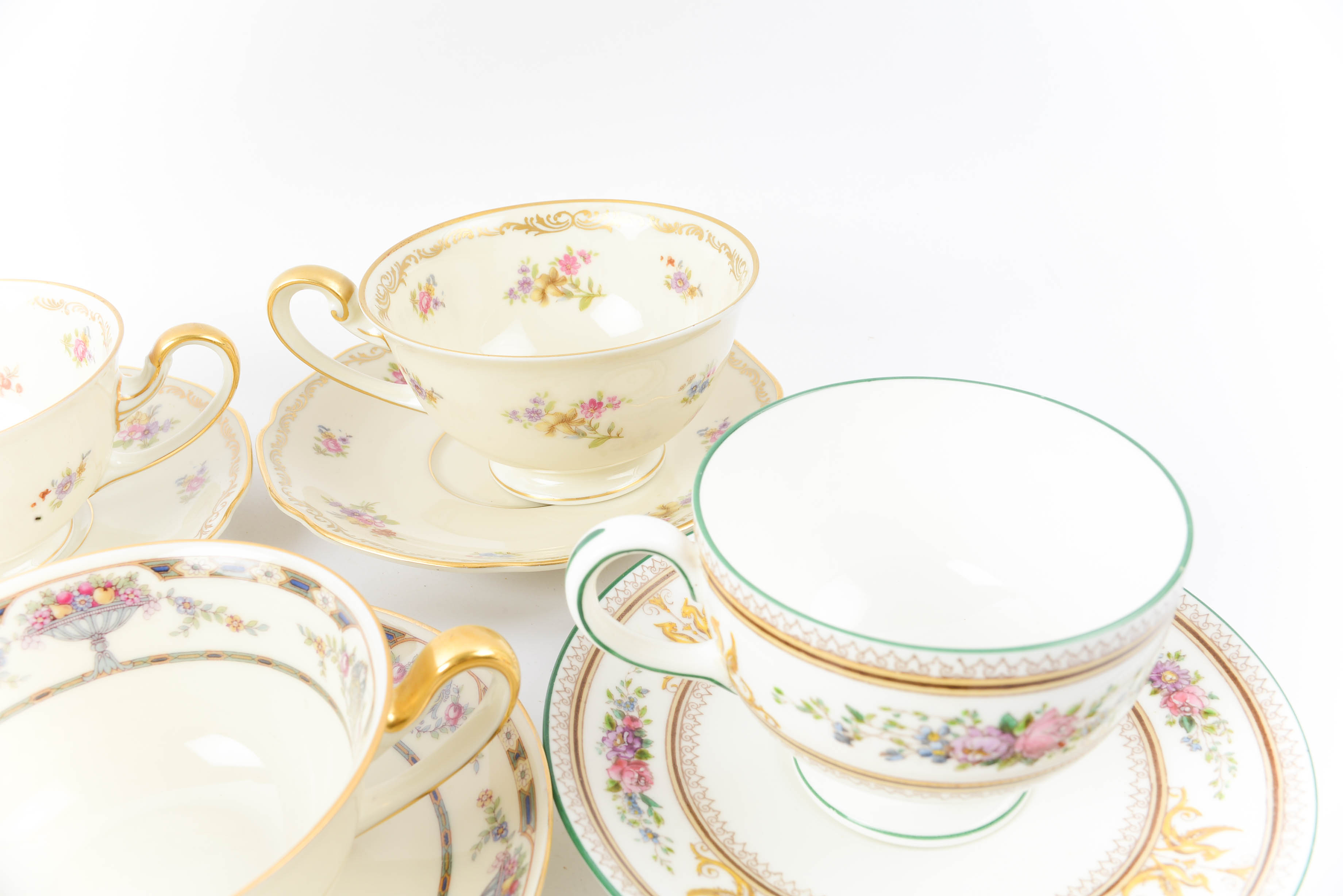 Collection of Floral Motif Teacup and Saucer Sets