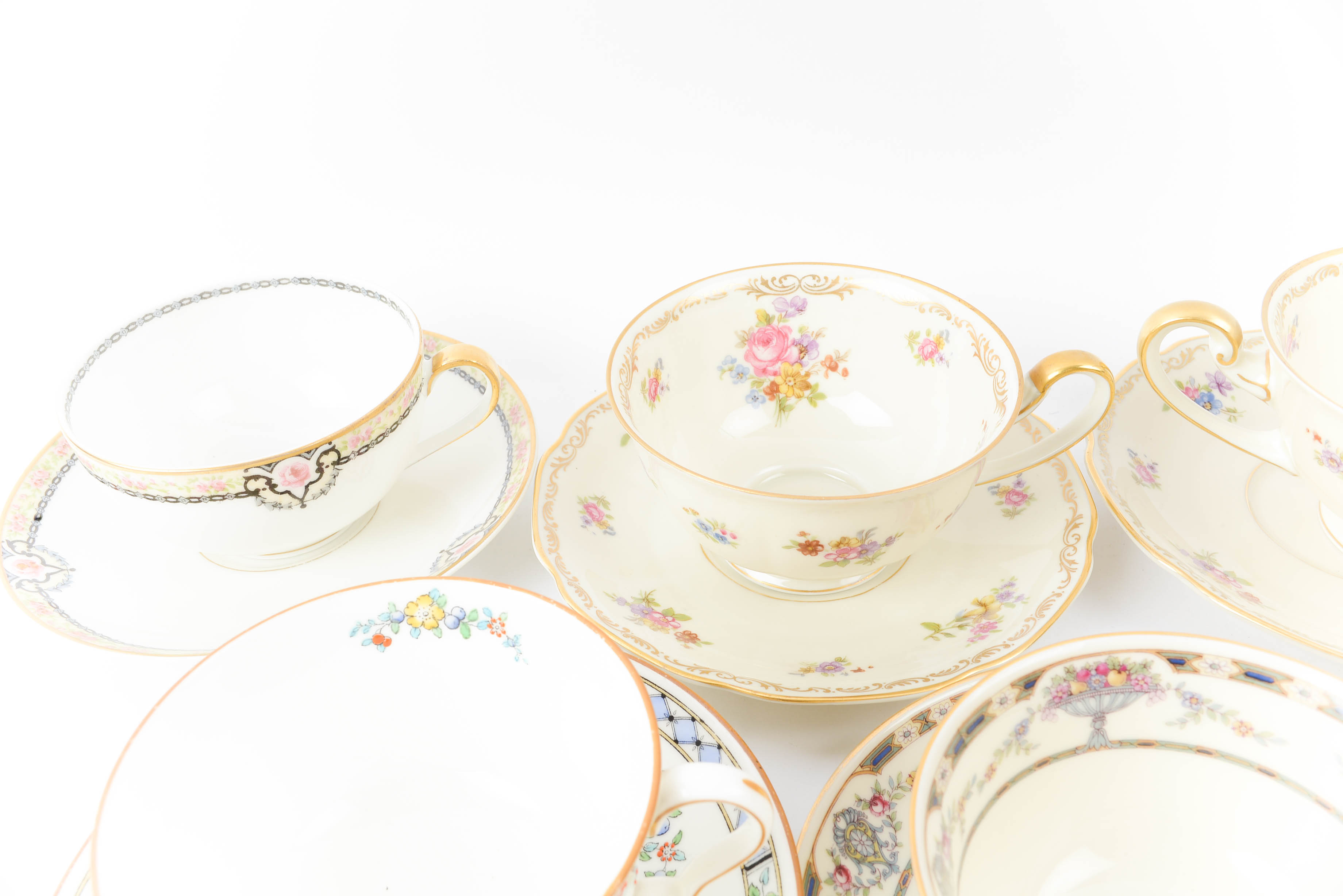 Collection of Floral Motif Teacup and Saucer Sets