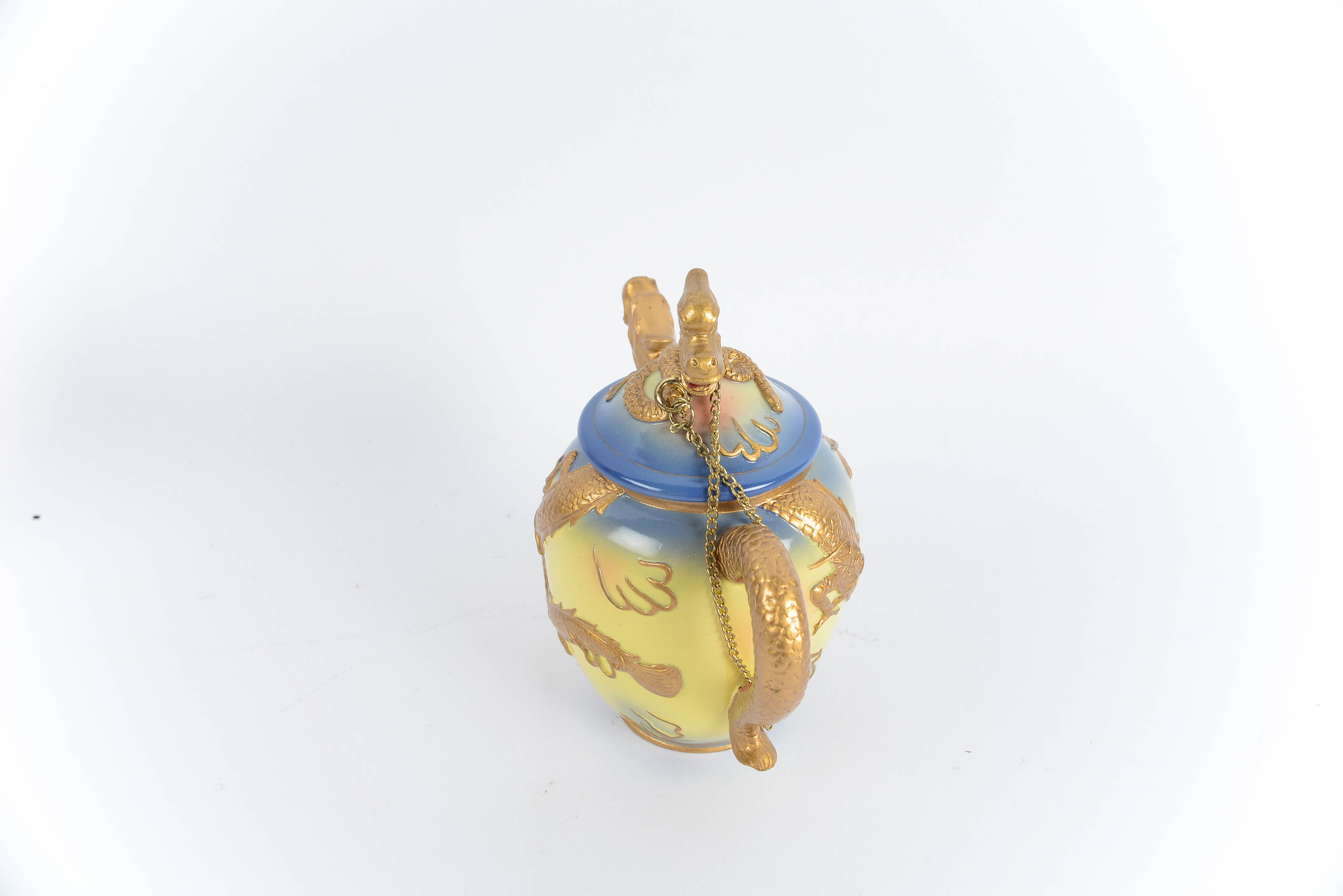 Collection of Nini Hand-Painted Miniature Teapots