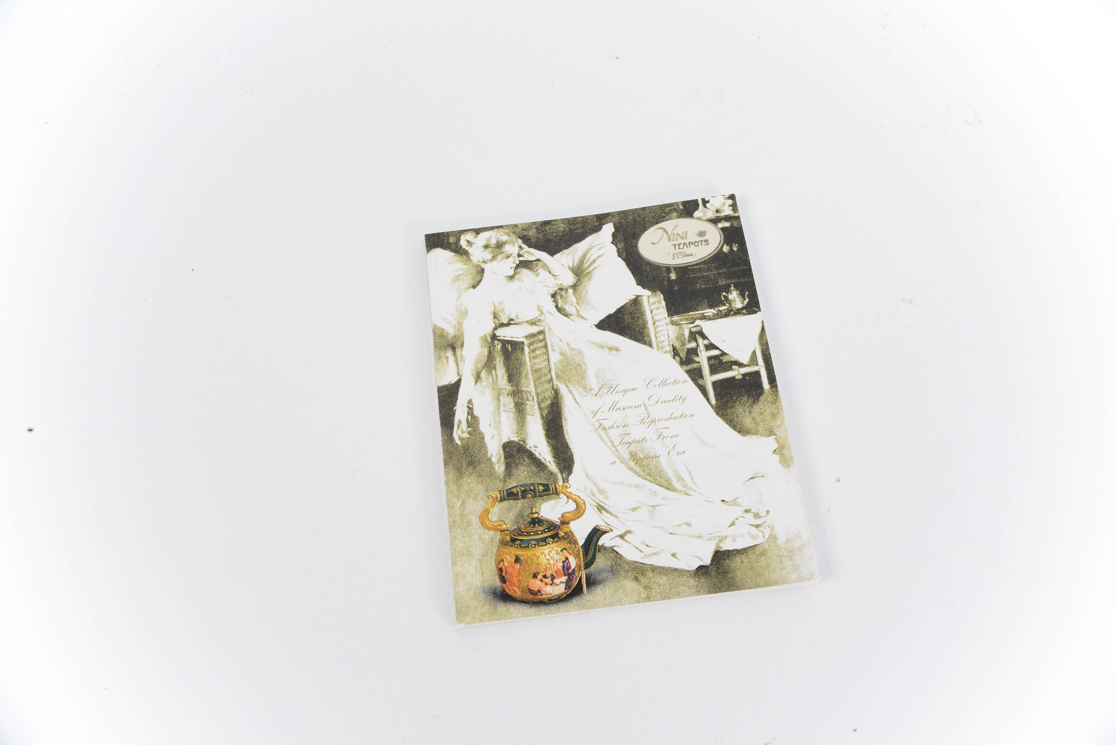 Collection of Nini Hand-Painted Miniature Teapots