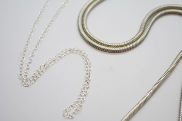 Three Stering Silver Necklaces and Three Sterling Silver Brooches