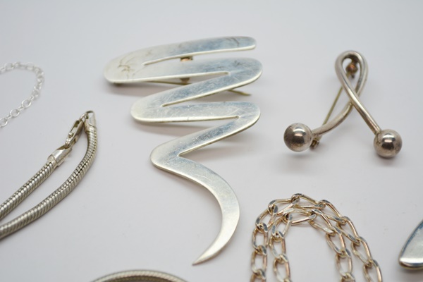 Three Stering Silver Necklaces and Three Sterling Silver Brooches