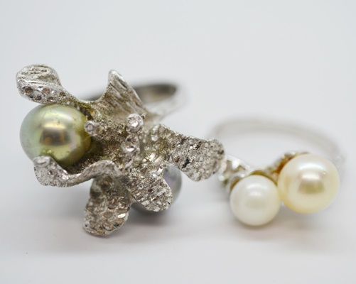 Three Sterling Silver Rings and One 900 Silver Brooch