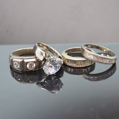 Four Sterling Silver Cubic Zirconia Rings