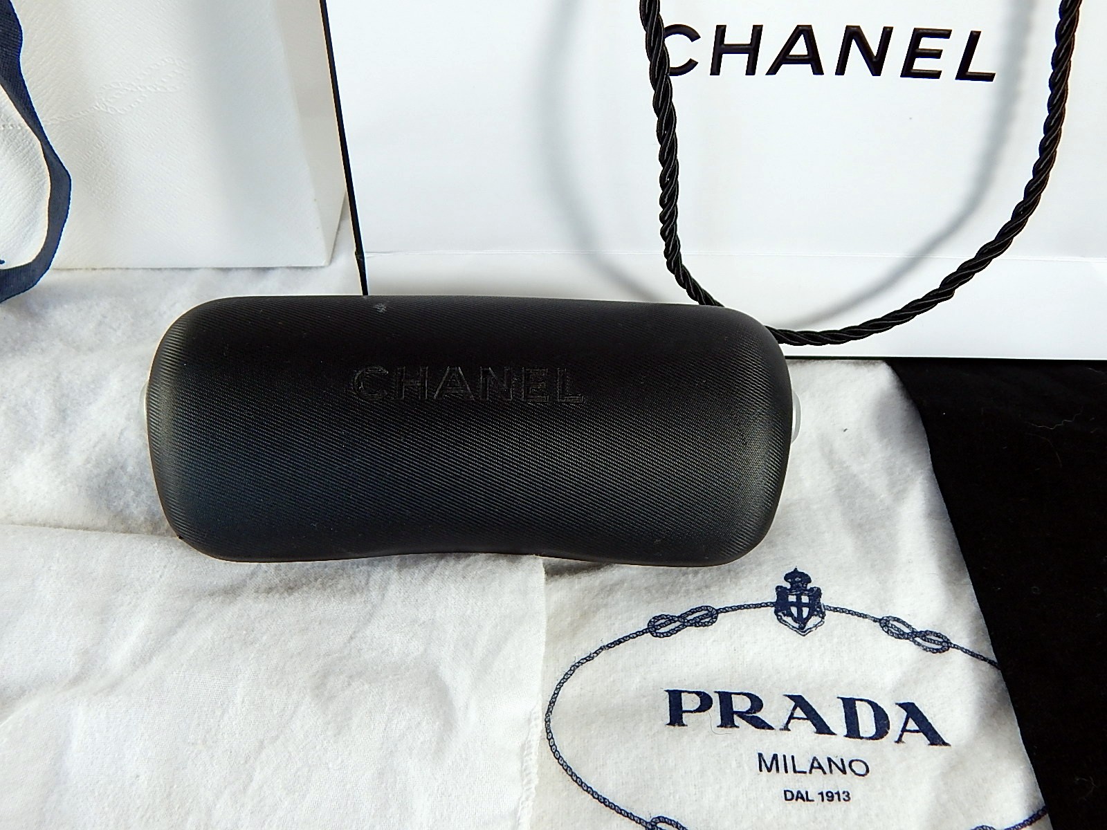 Prada, Chanel and Ferragamo Dust Bags and Packaging