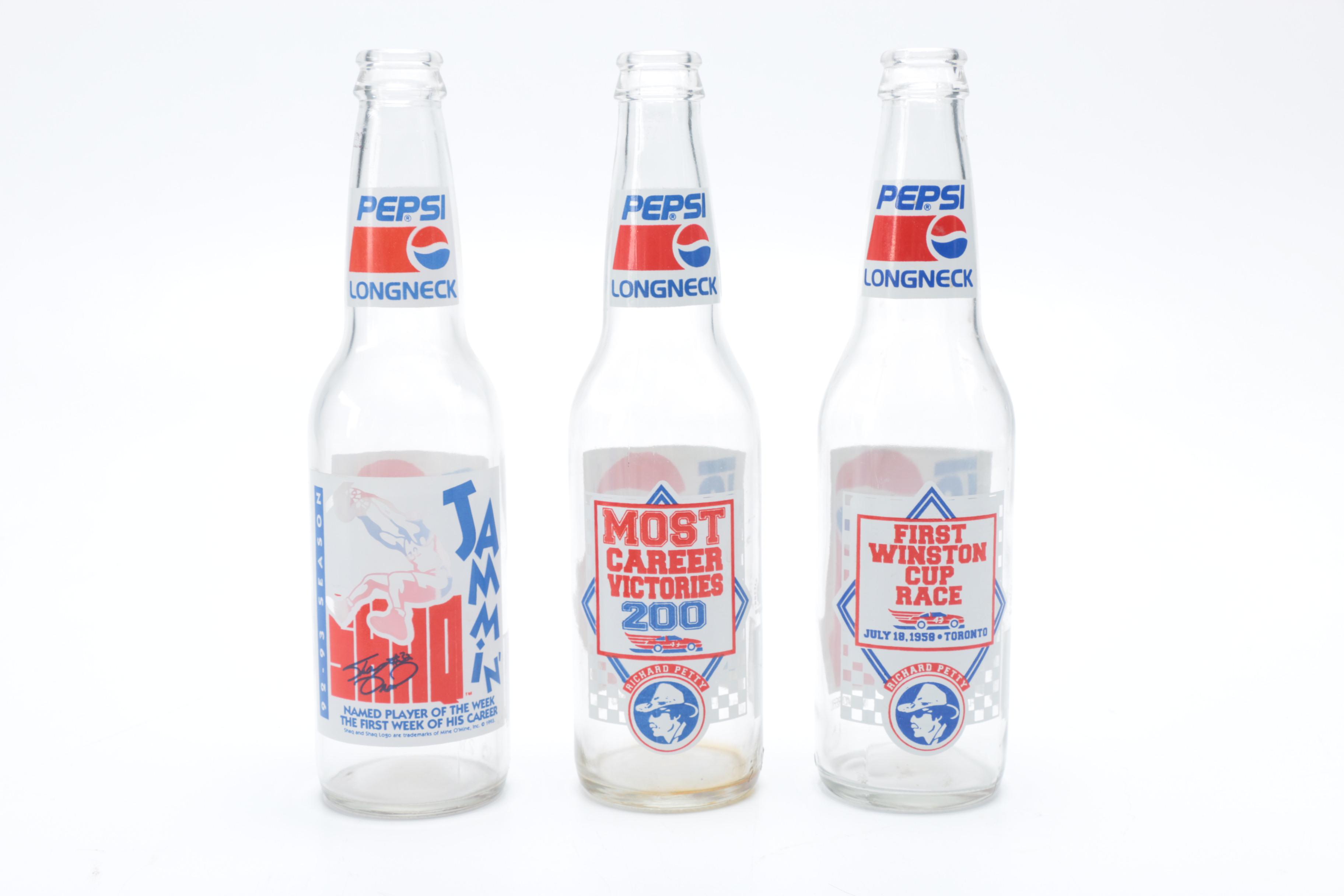 Collection of Pepsi Bottles and Cans