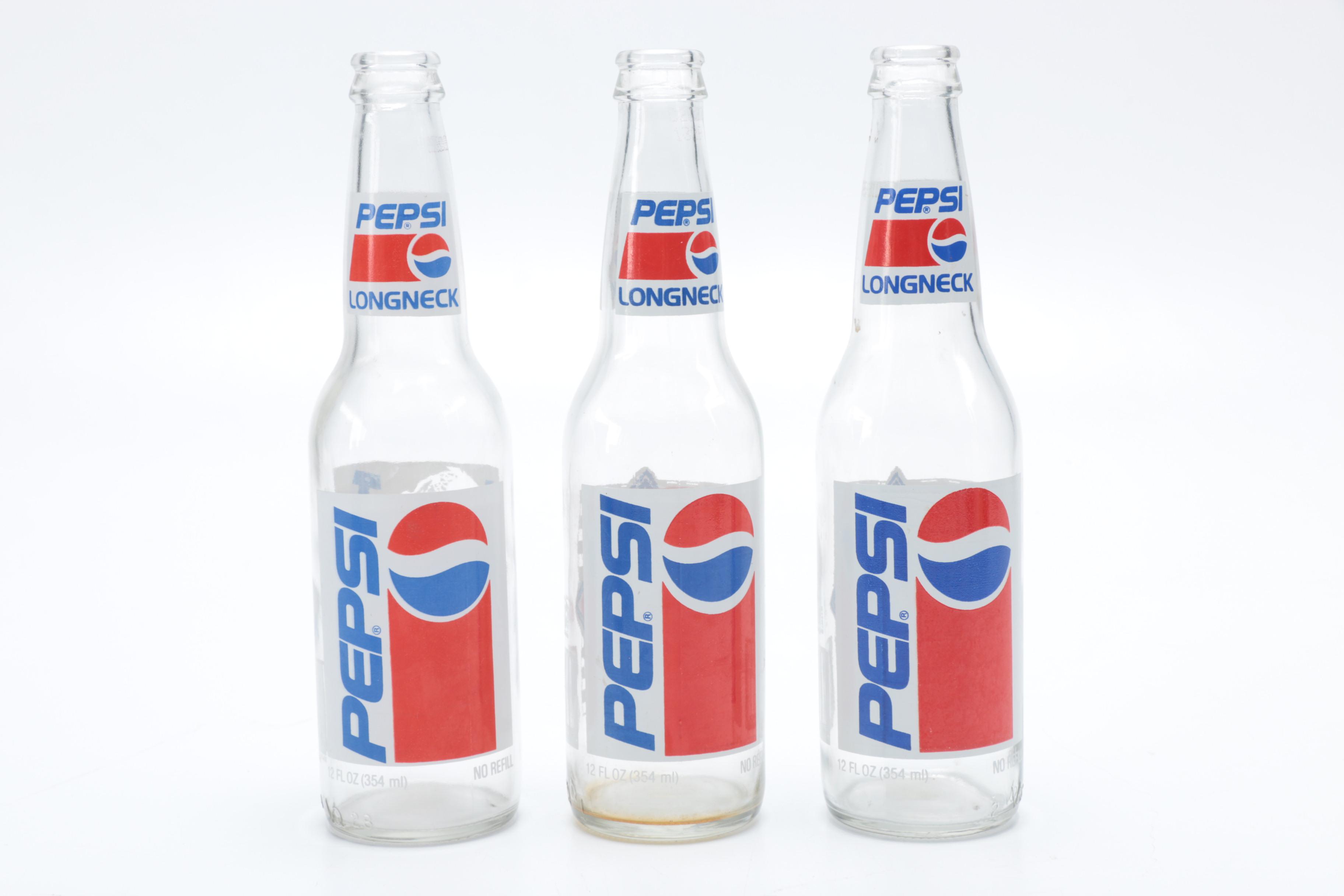 Collection of Pepsi Bottles and Cans