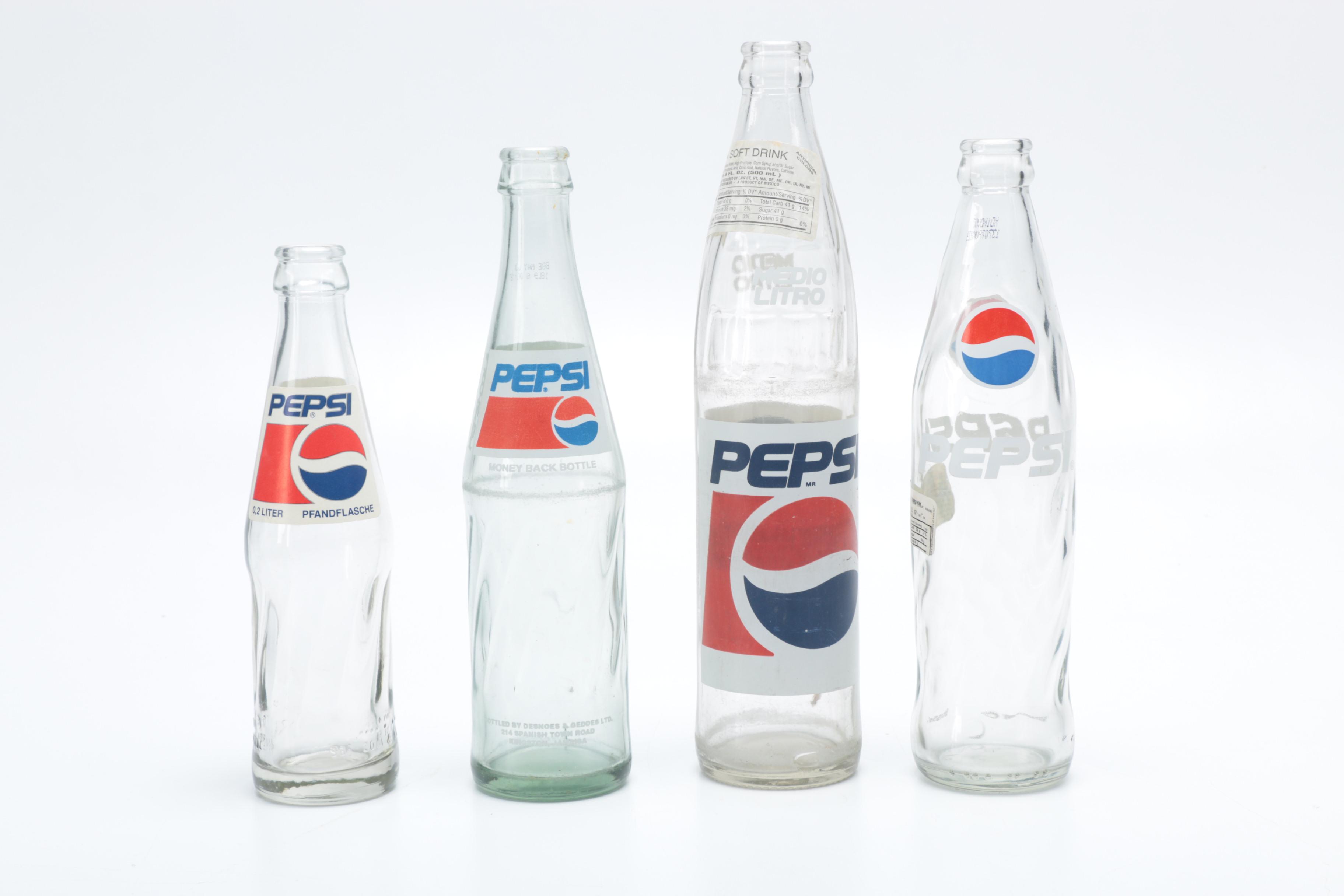 Collection of Pepsi Bottles and Cans
