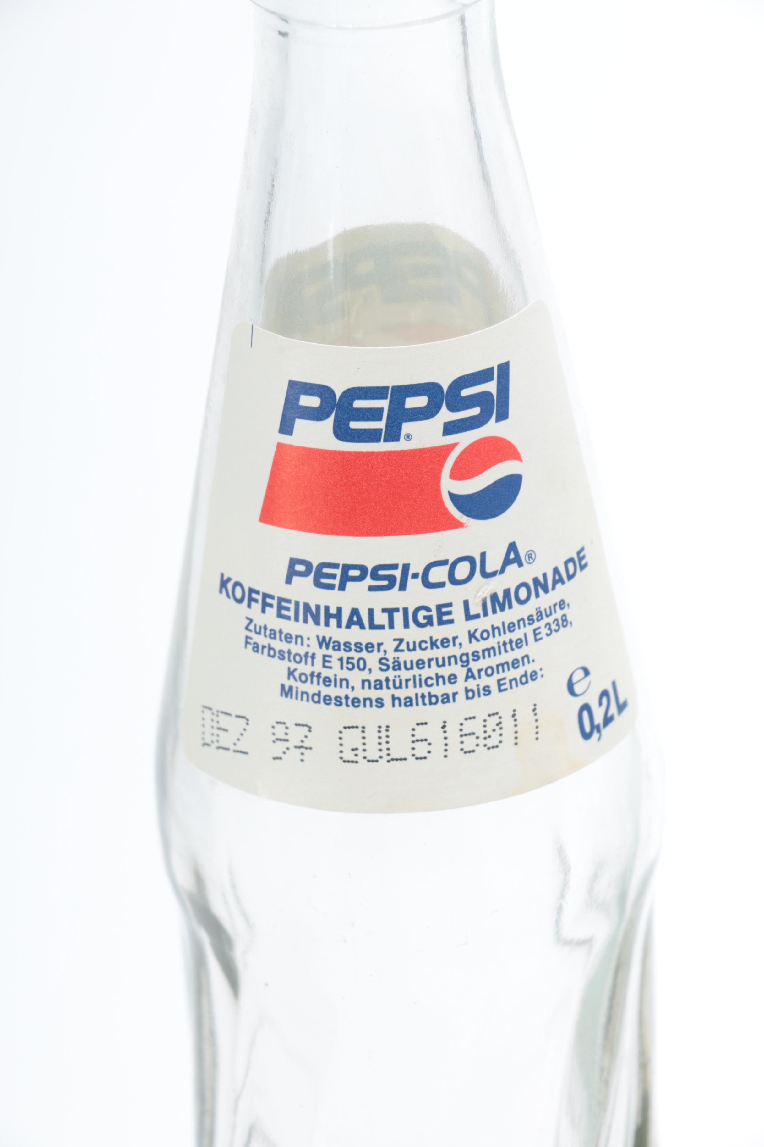 Collection of Pepsi Bottles and Cans