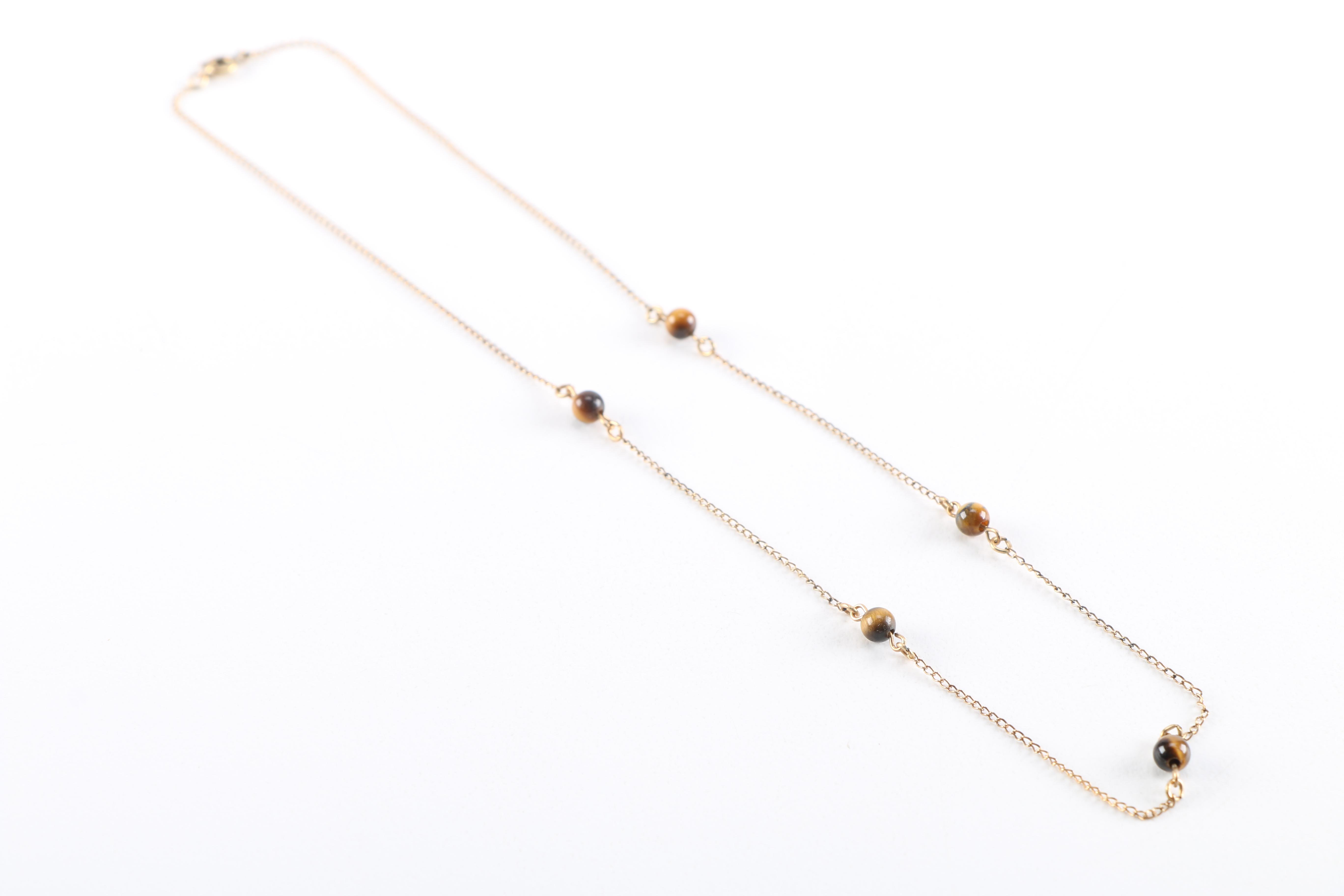 Costume Jewelry Including Cultured Pearl