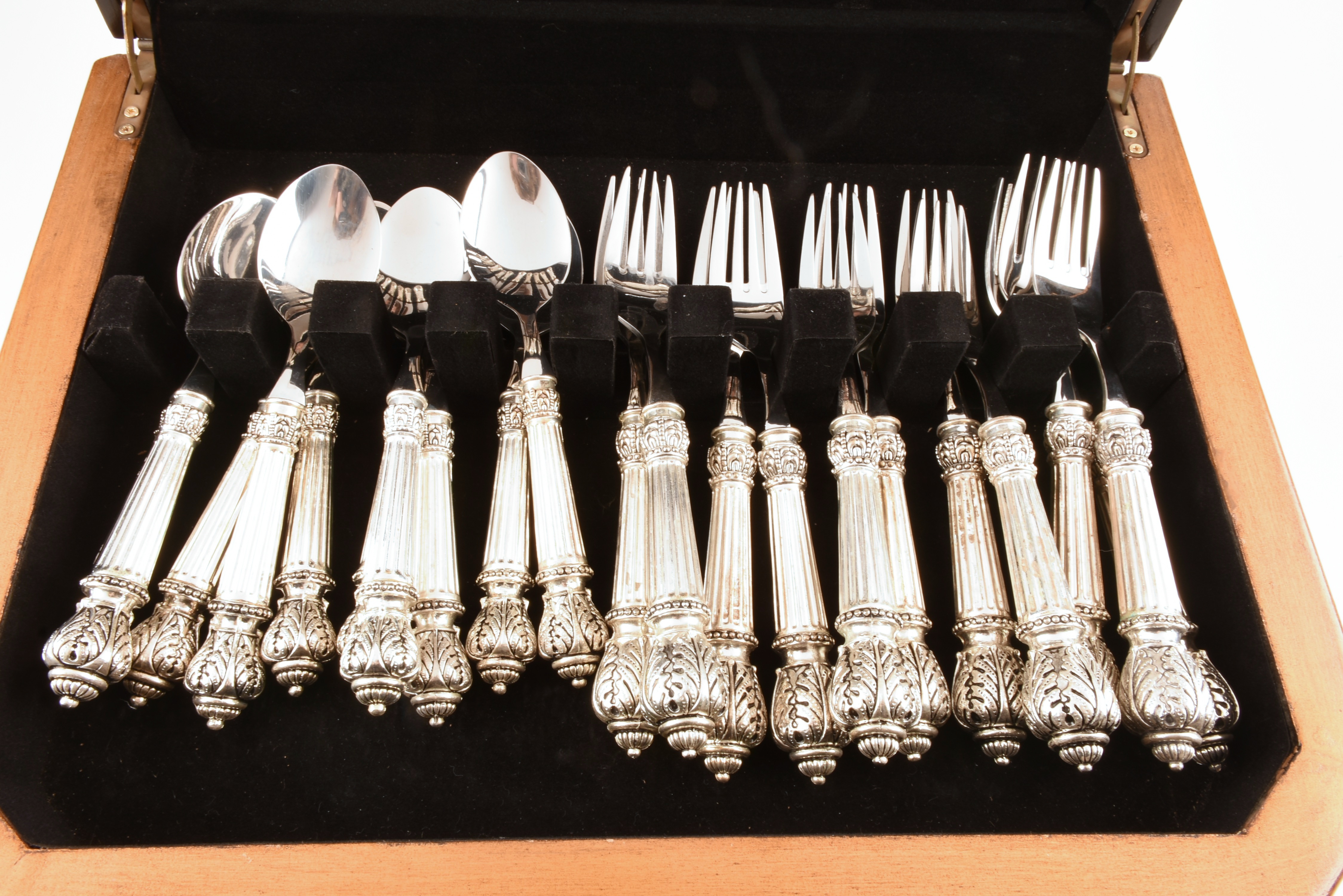 Elegant Flatware with Round Reeded Handles and Acanthus Reede