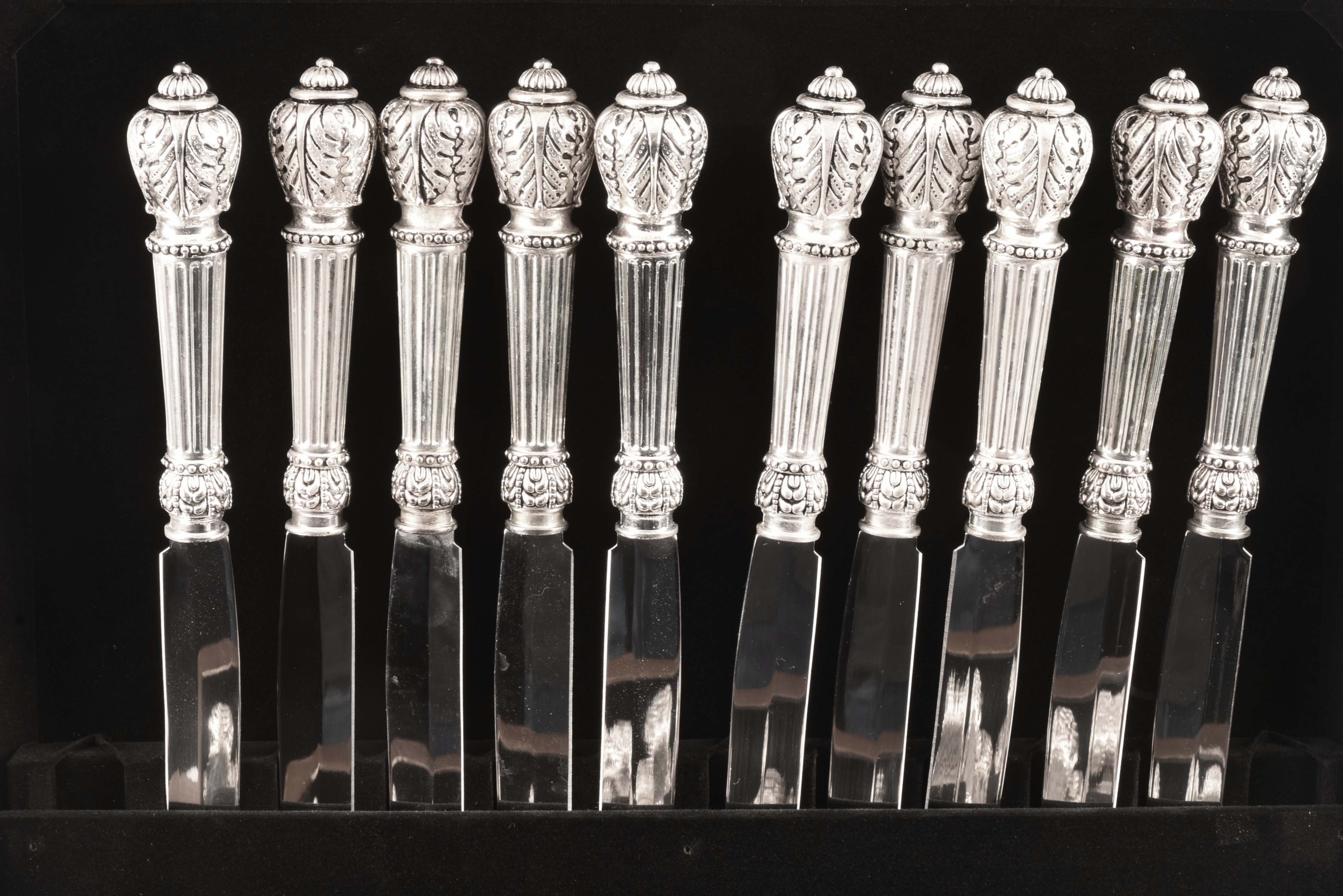 Elegant Flatware with Round Reeded Handles and Acanthus Reede