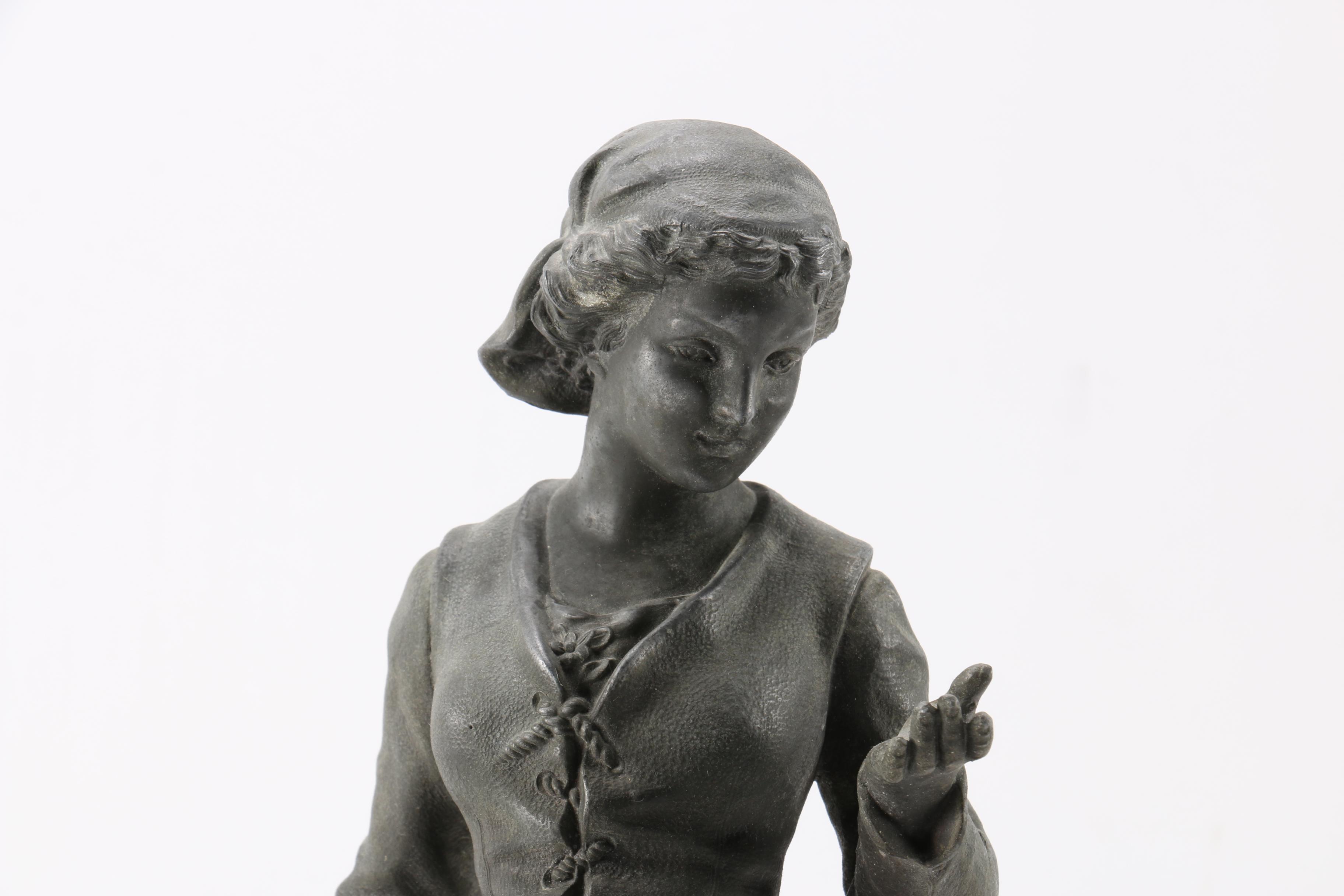 Cast Metal Figures of Peasants