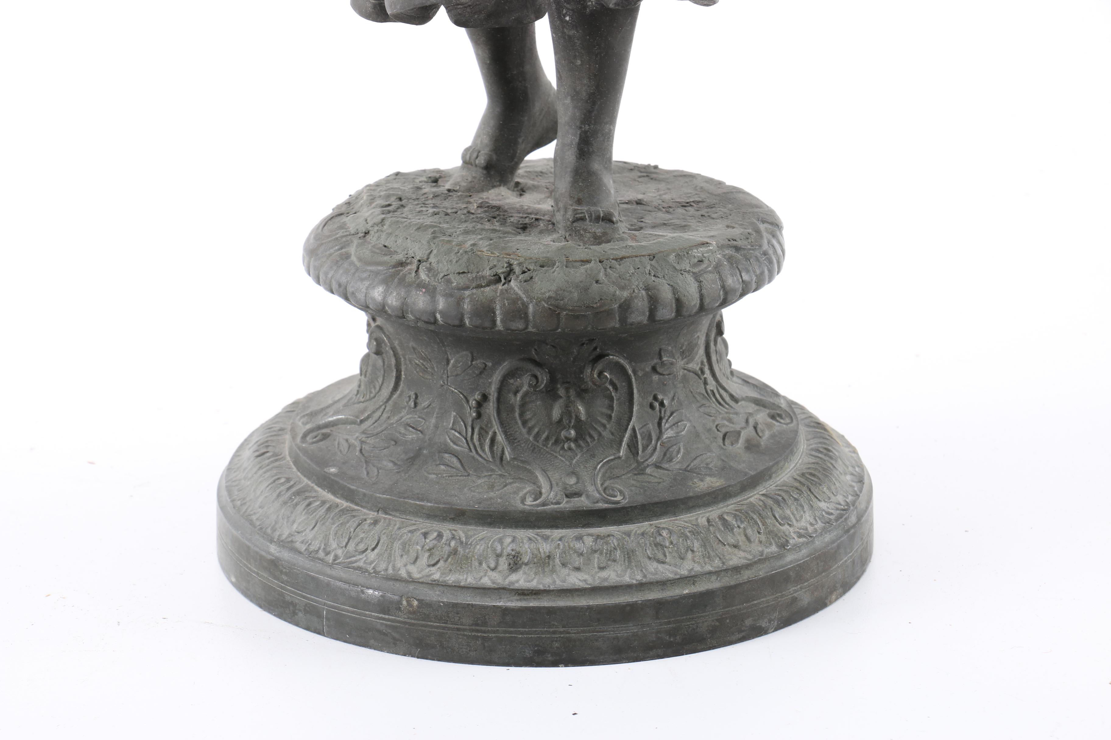 Cast Metal Figures of Peasants