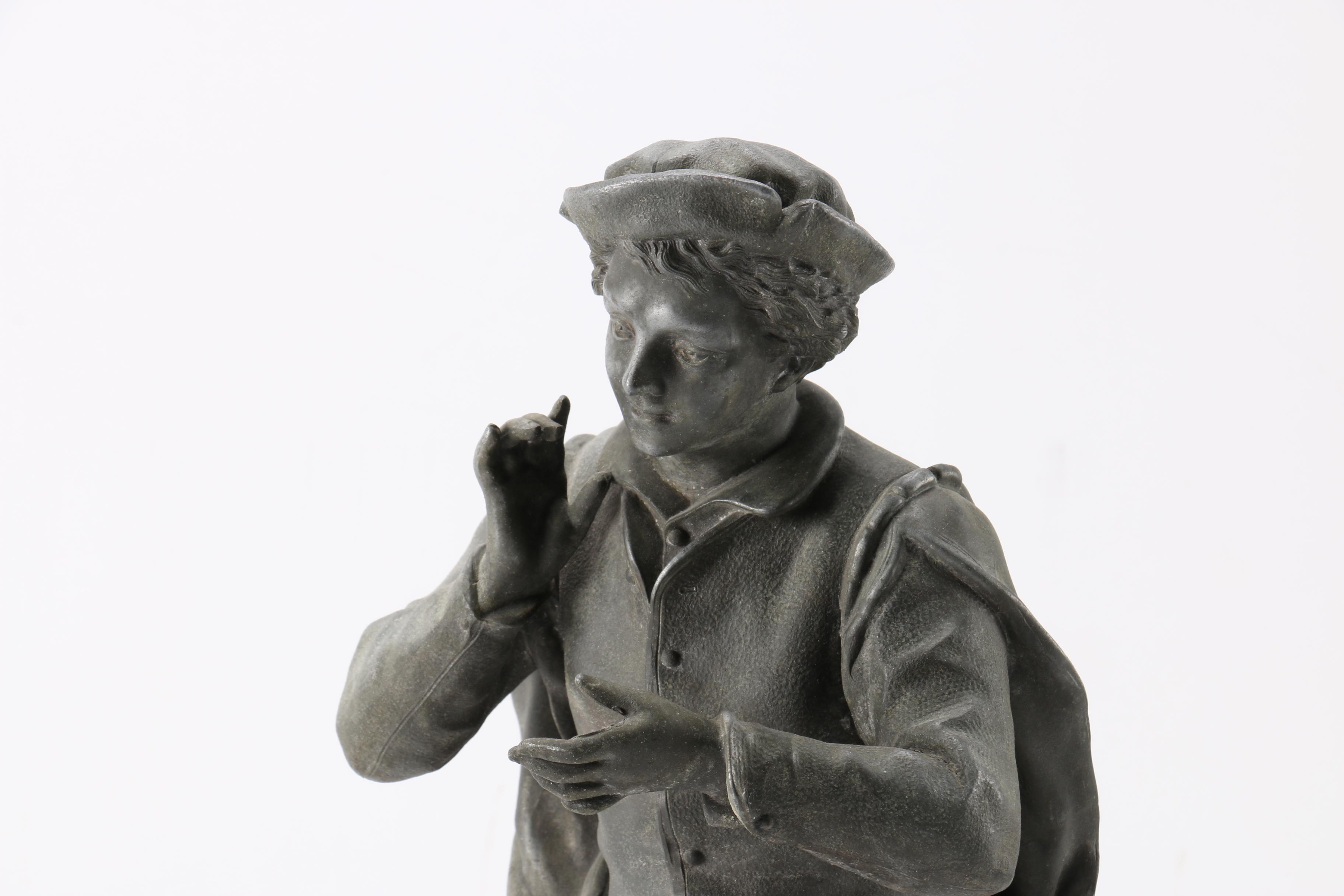 Cast Metal Figures of Peasants