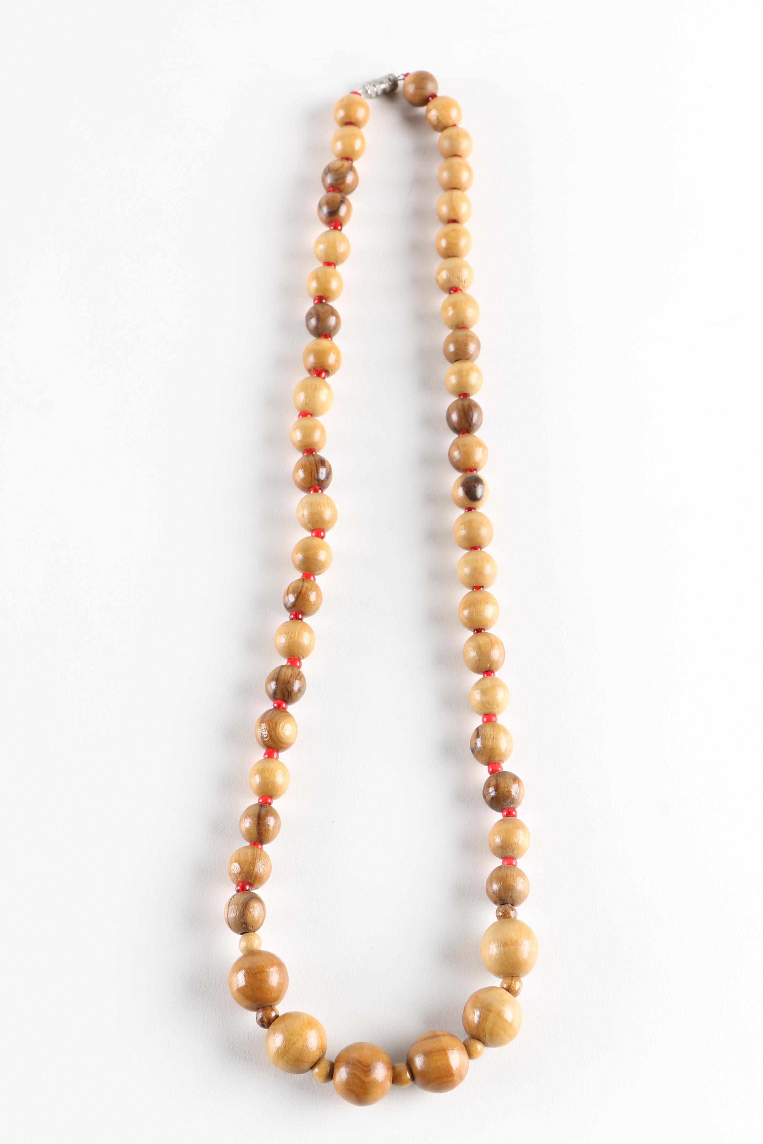 Assortment of Gold-Tone and Wood Costume Jewelry