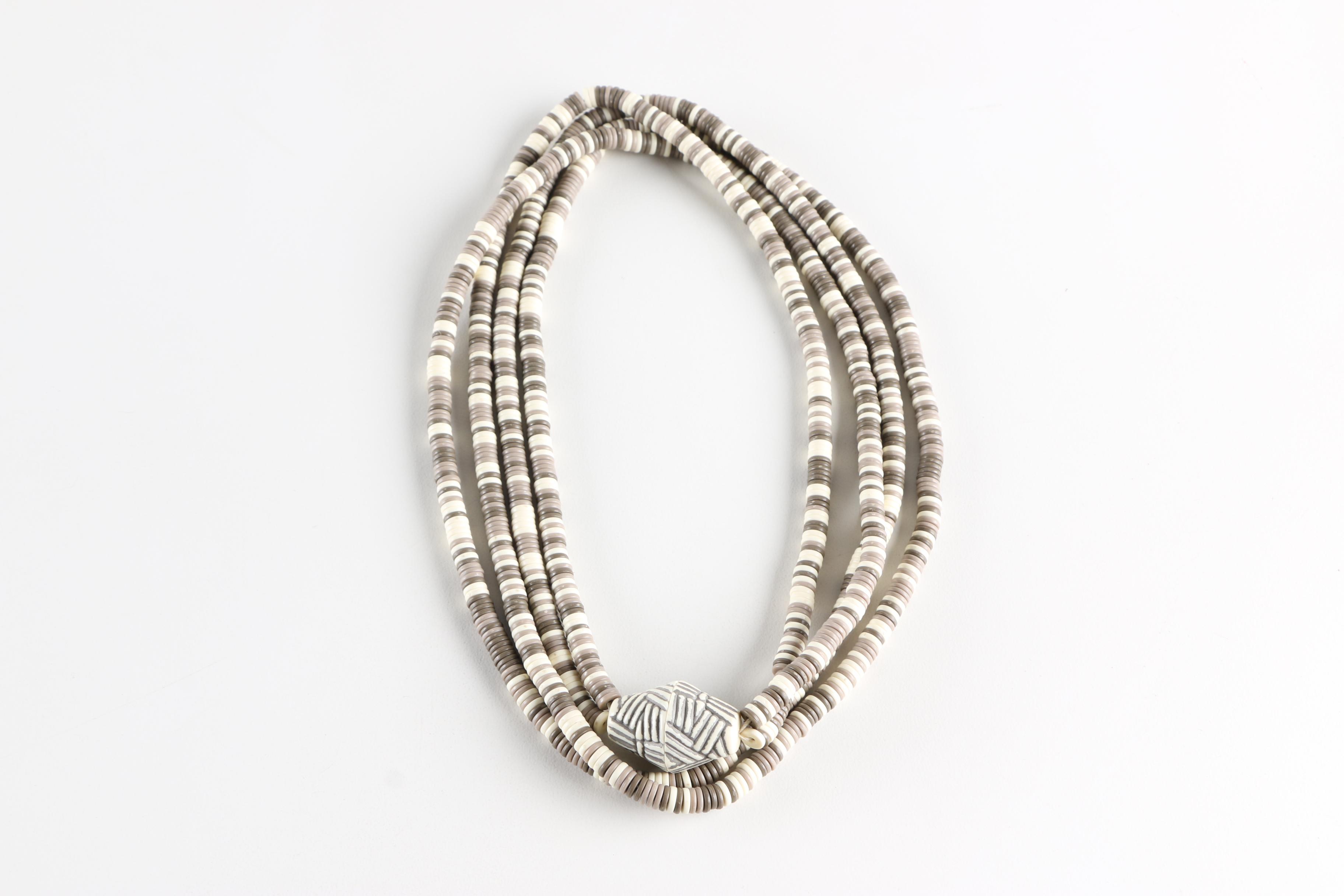 Assortment of Gold-Tone and Wood Costume Jewelry