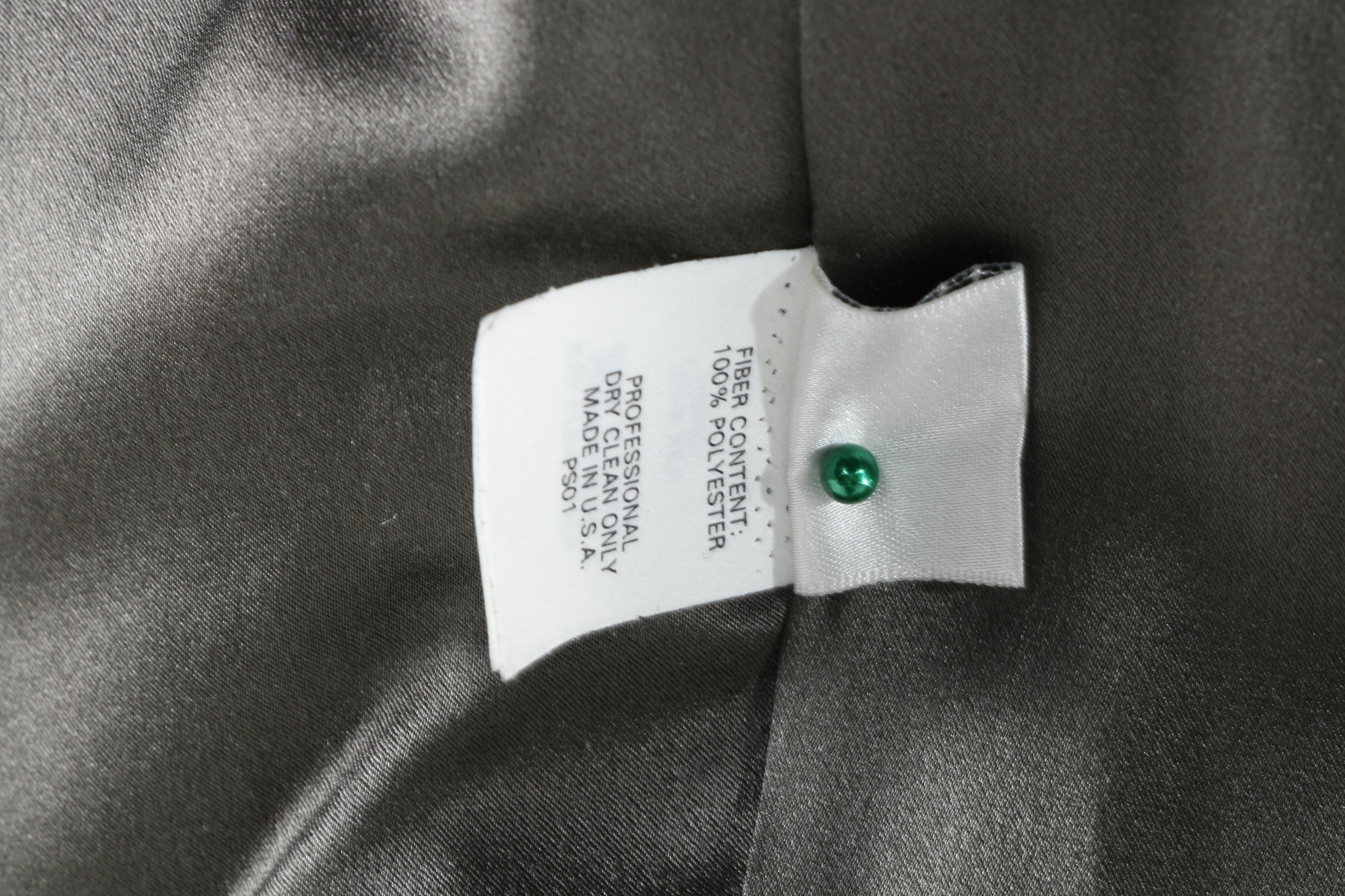 Richard Tyler Couture Women's Suit and Feathered Corset