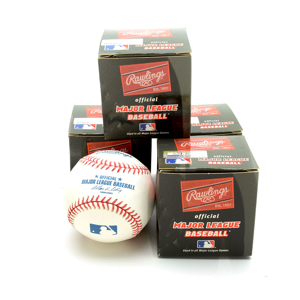 Four Major League Baseballs
