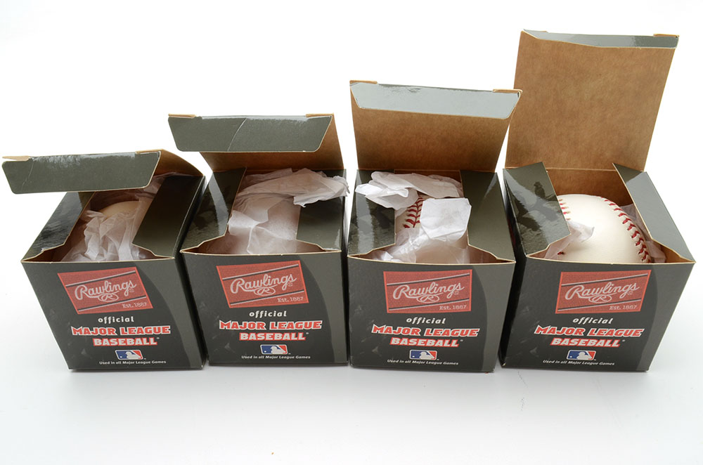 Four Major League Baseballs