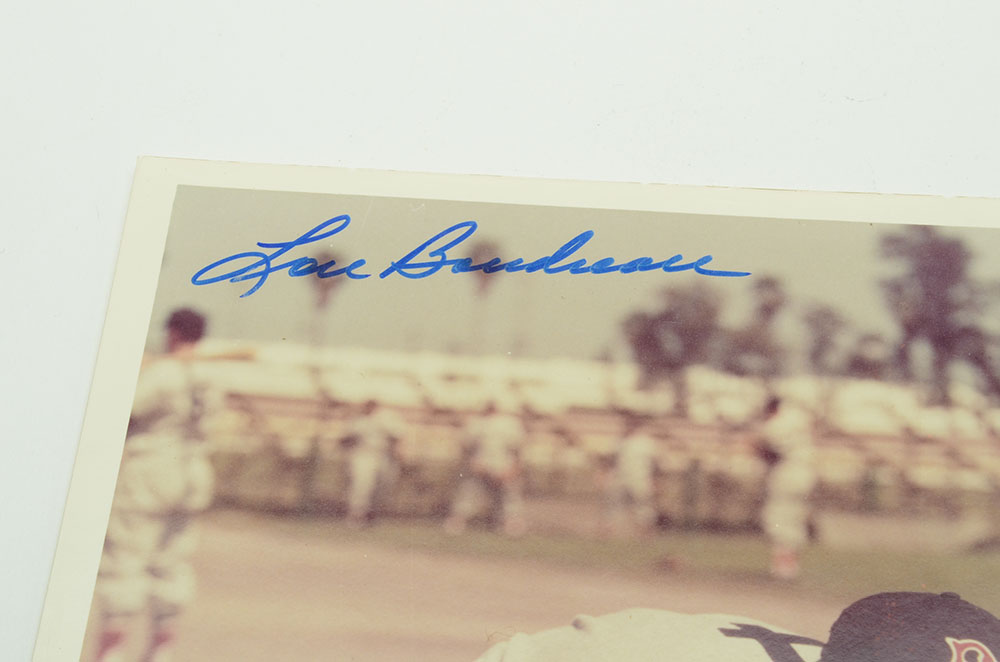 Lou Boudreau Signed Photo and 1948 Indians Scorebook