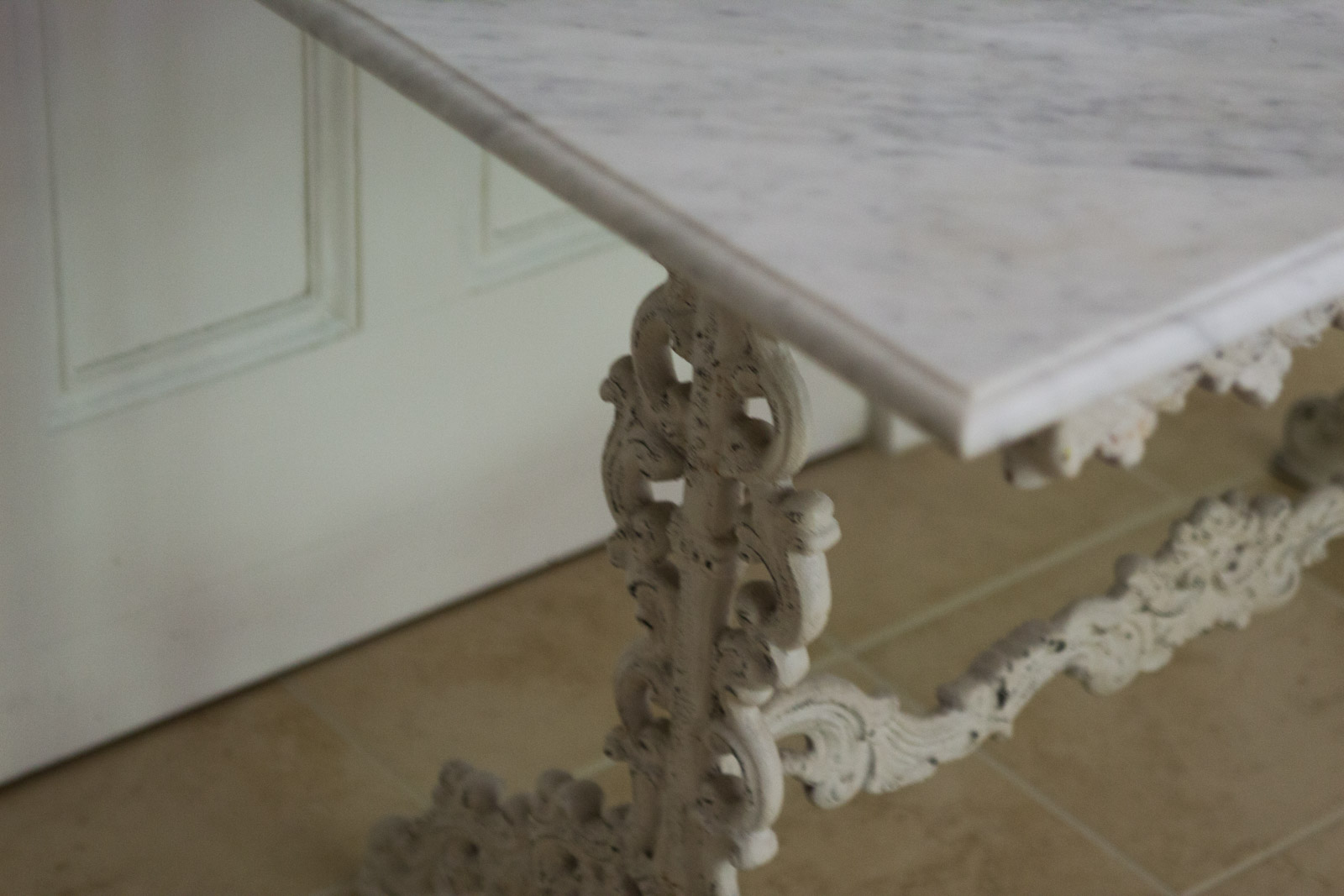 Marble Top Table with Decorative Cast Iron Base