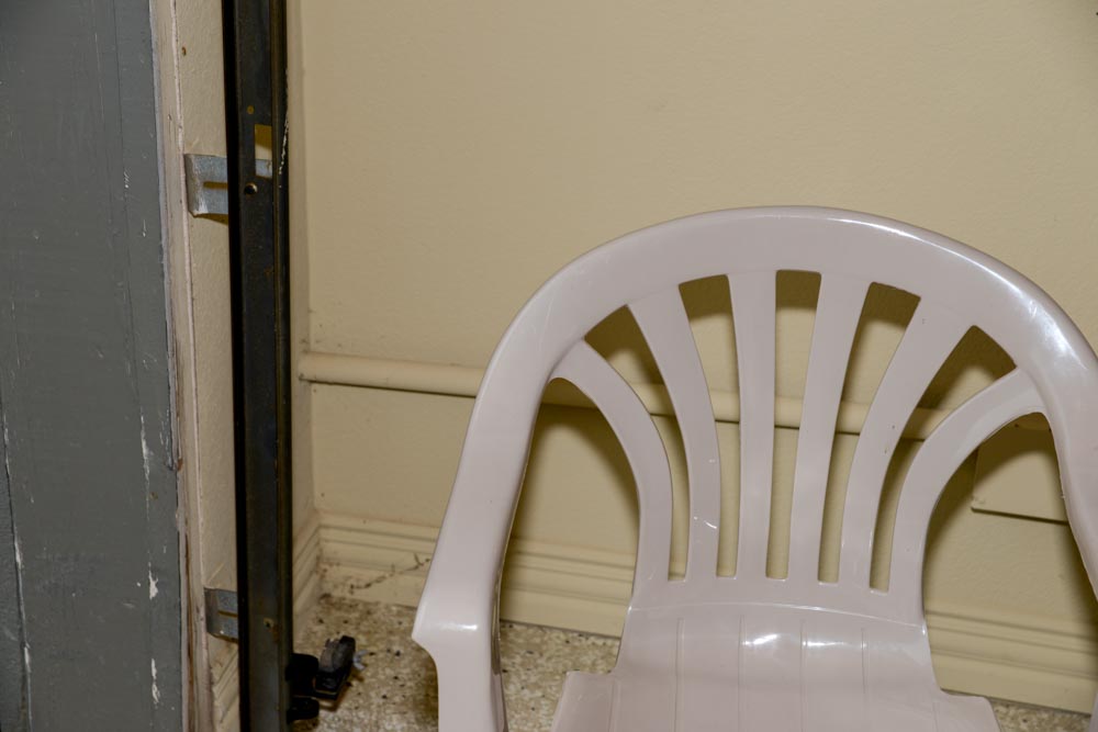 Patio Chairs With Trellis and Landscape Lights