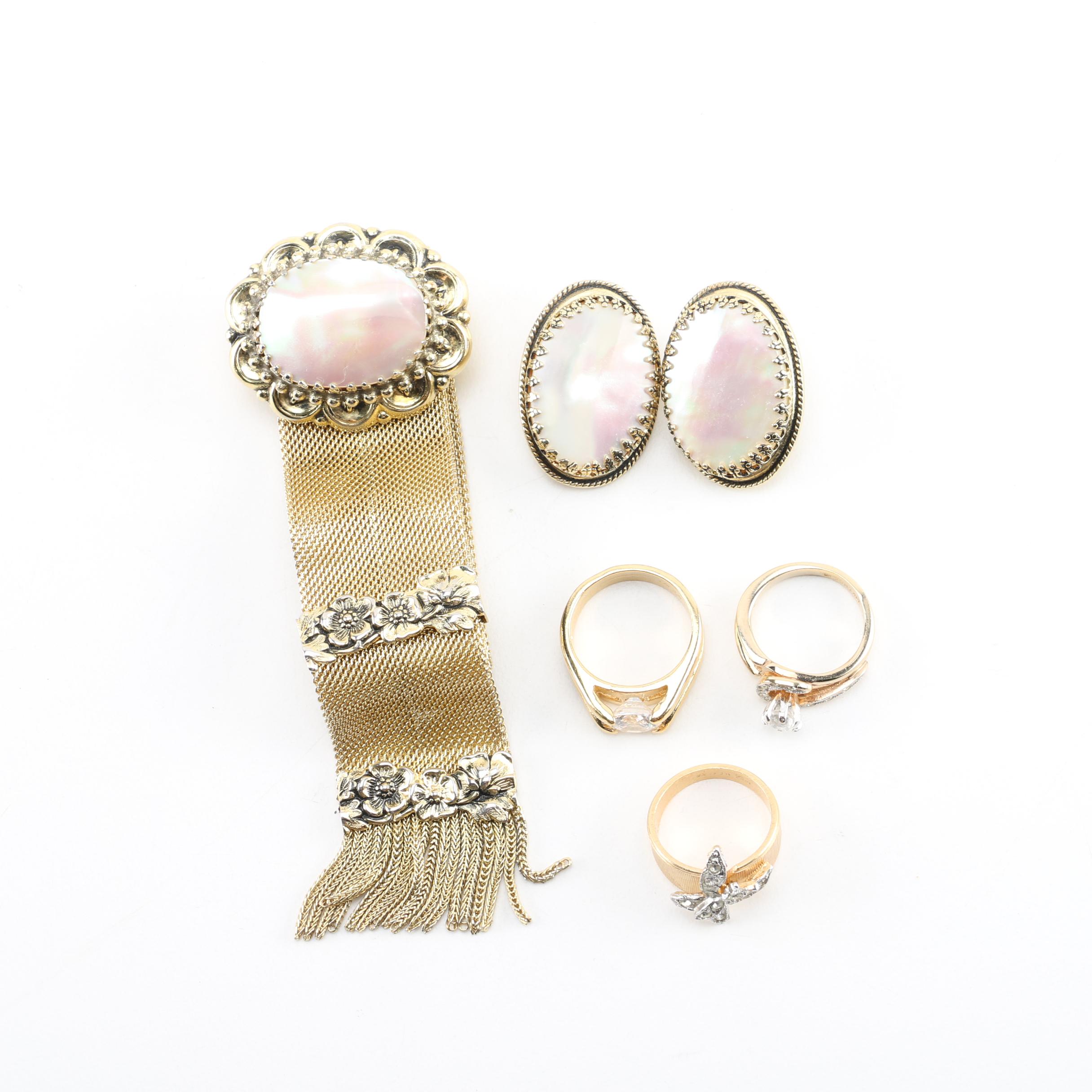 Gold Tone Jewelry Selection Including Shell Accent Bracelet