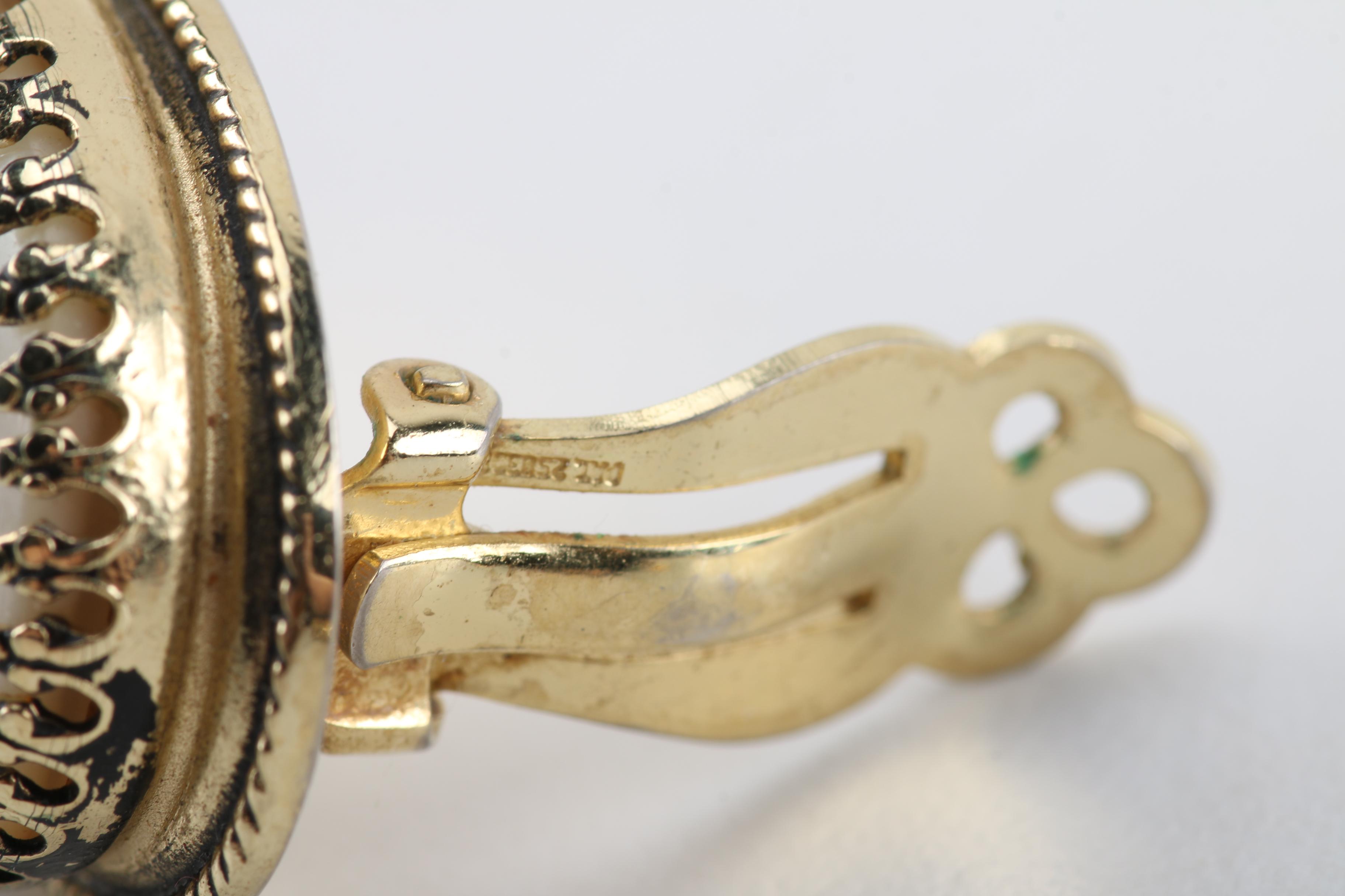 Gold Tone Jewelry Selection Including Shell Accent Bracelet