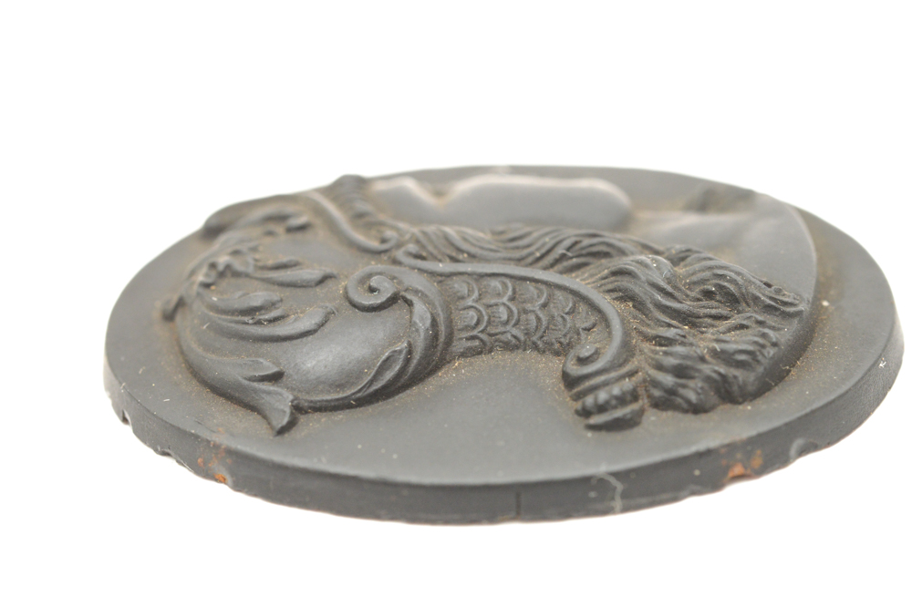 Black Medallion of Classic Figure