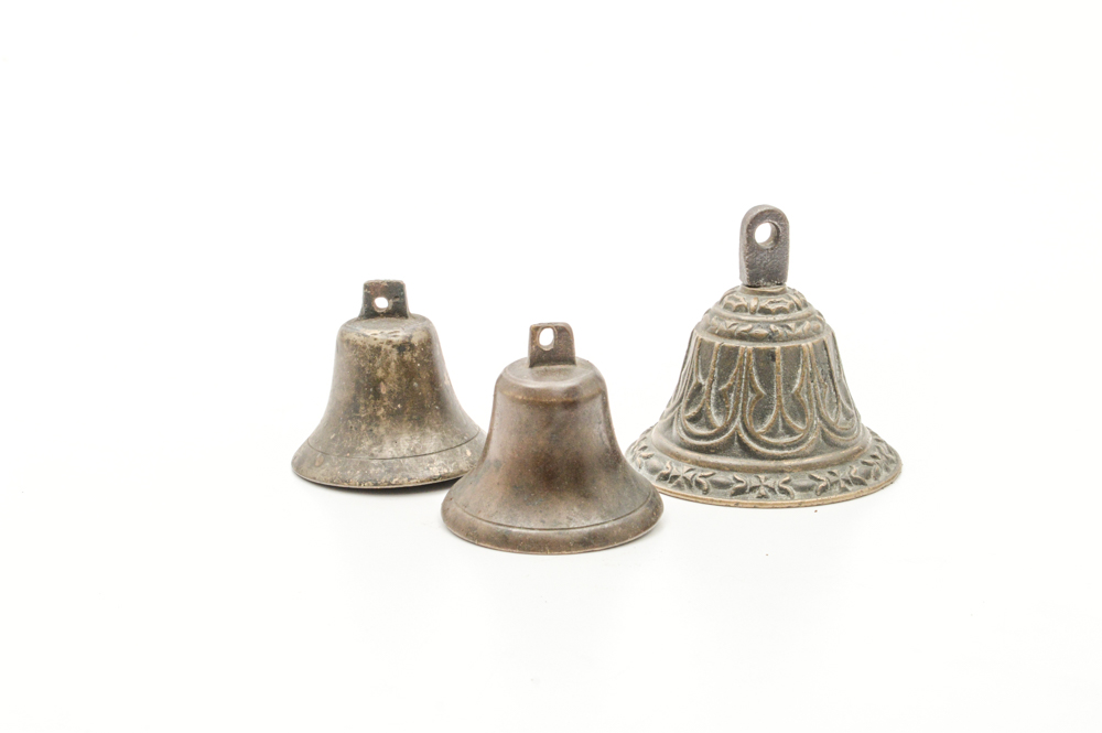 Three Antique Cast Metal Bells