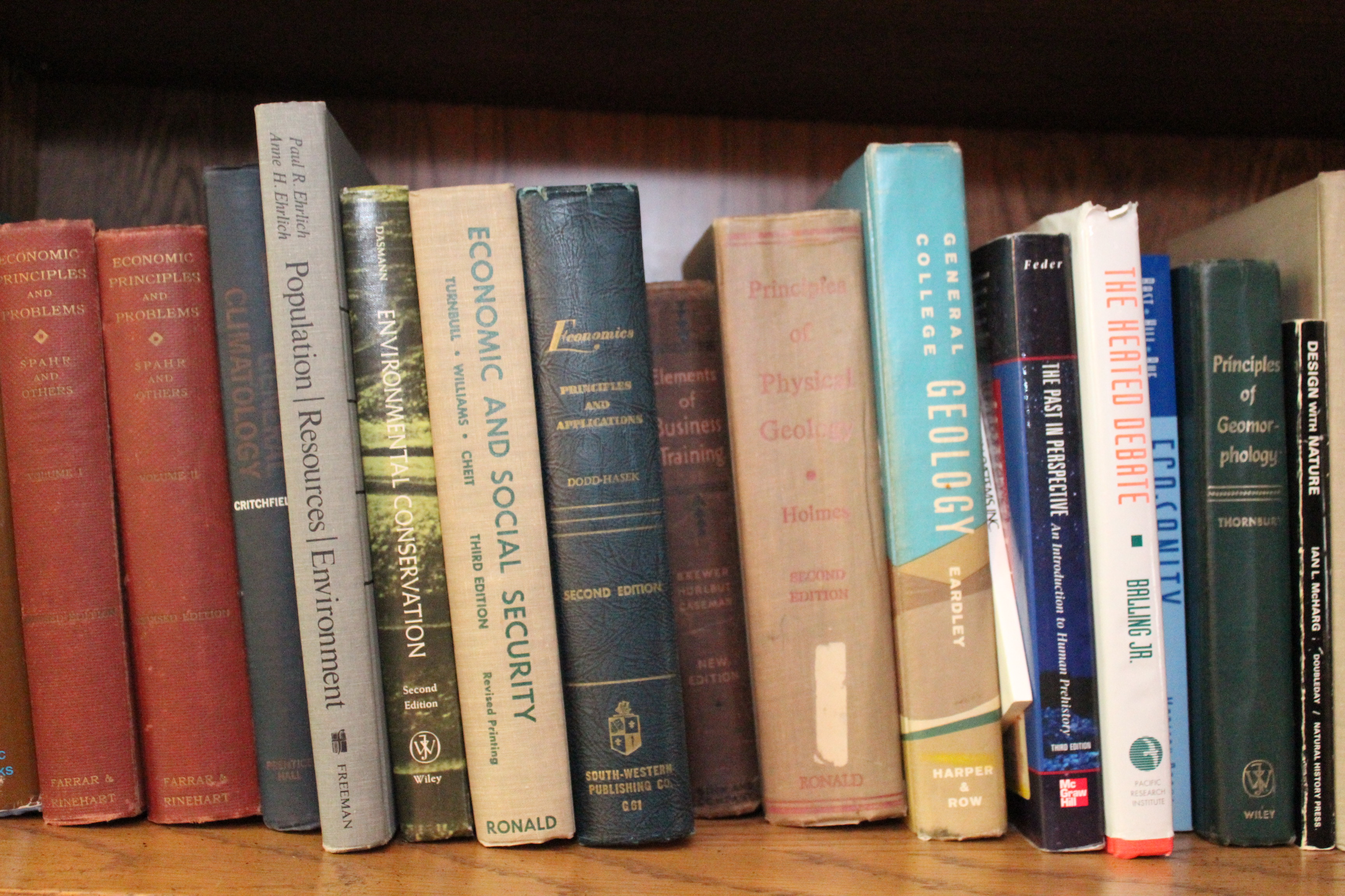 Assortment of Books on Economics, Environmental and Geology.