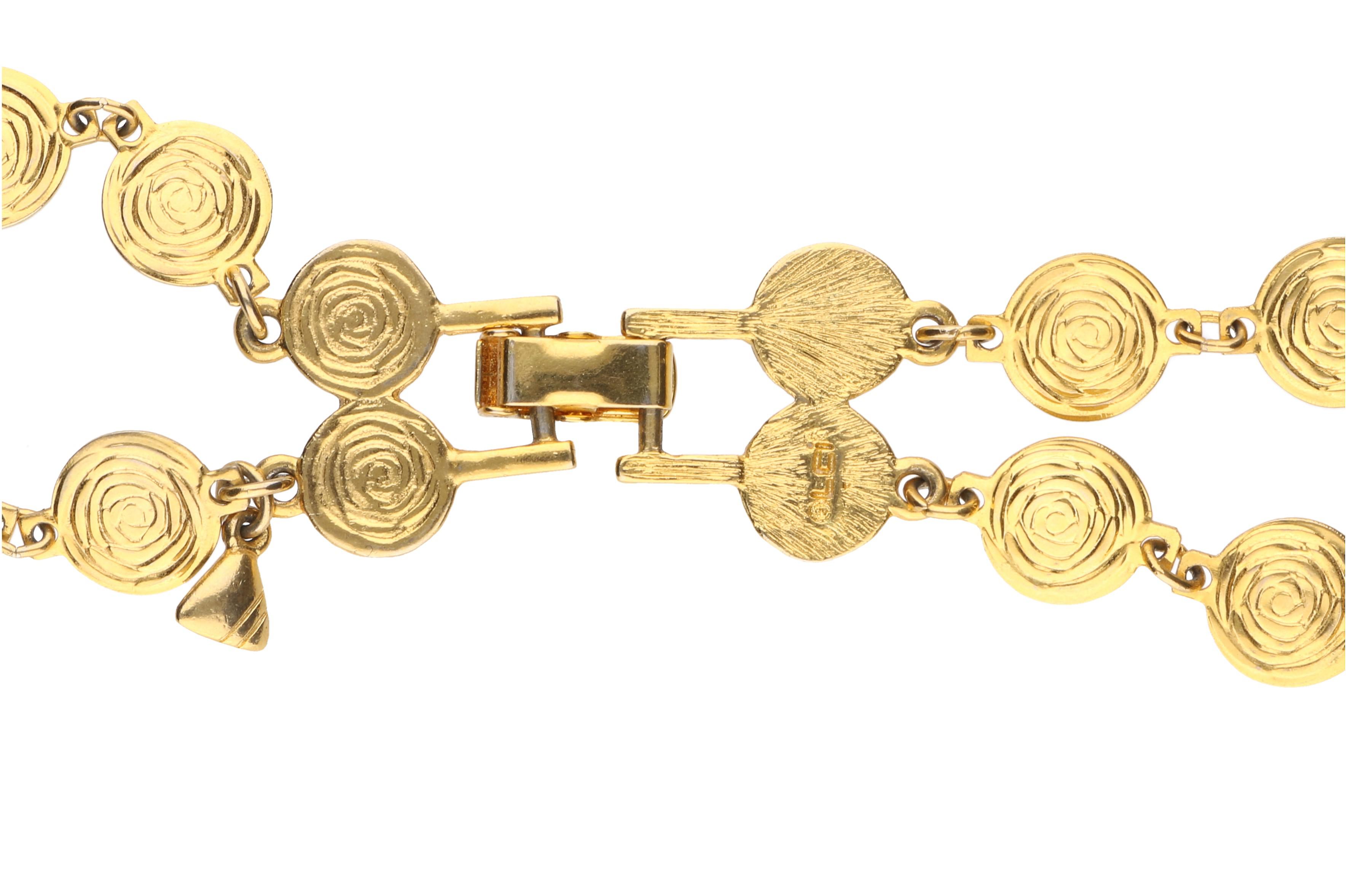 Assortment of Gold Toned Jewelry Including Jennifer Lopez