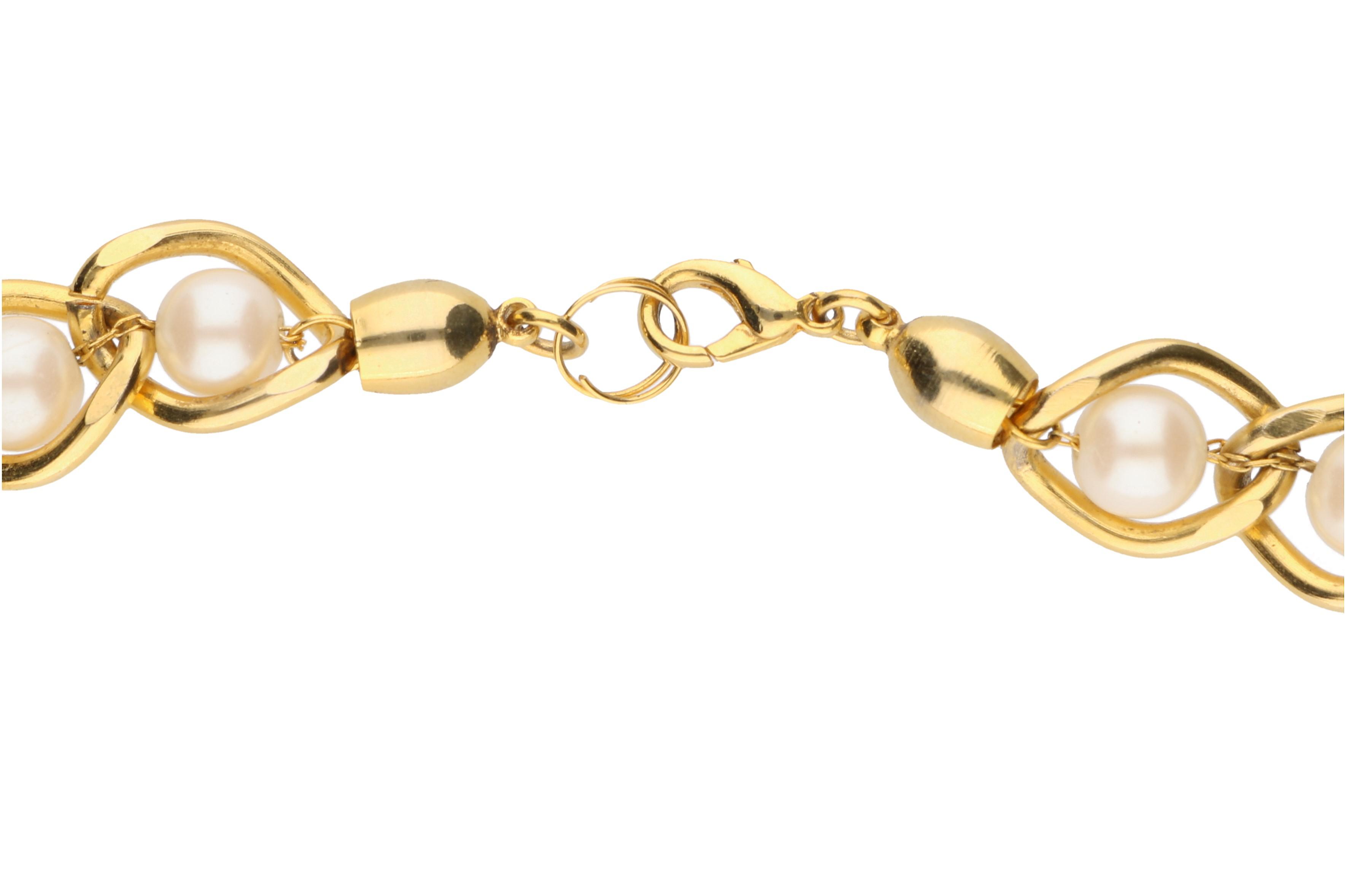 Assortment of Gold Toned Jewelry Including Jennifer Lopez