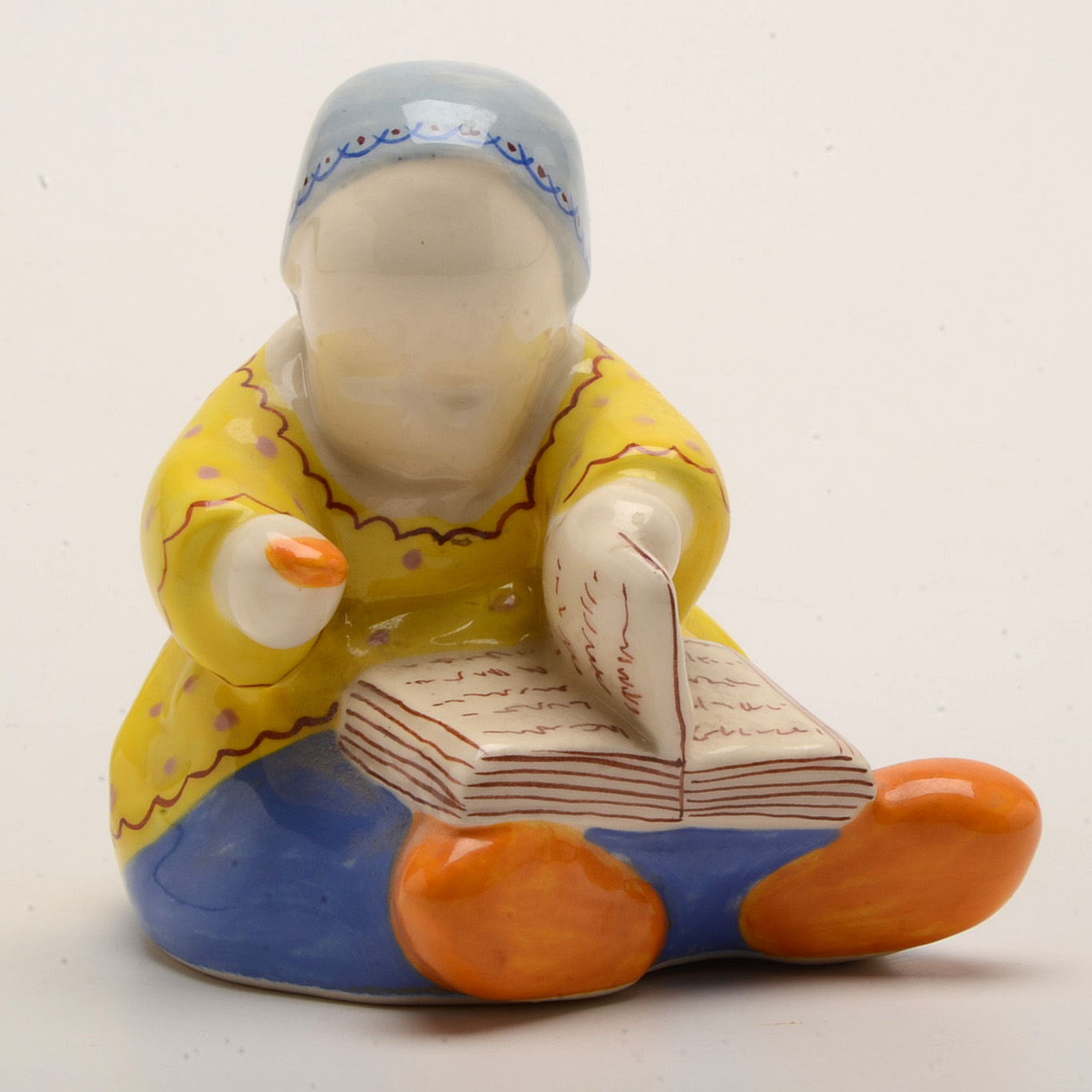 Henriot Quimper "Baby with Book" by Berthe Savigny