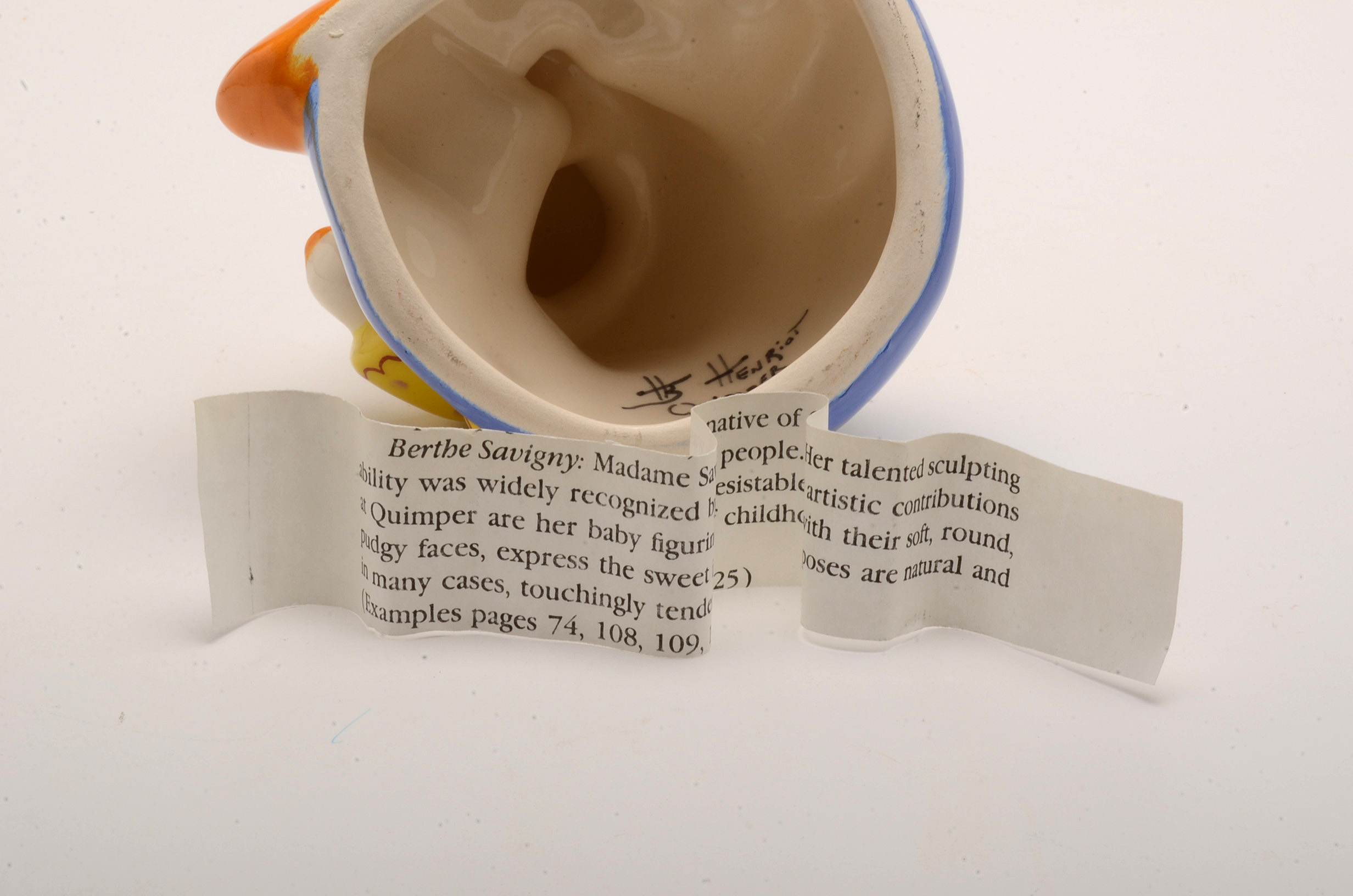 Henriot Quimper "Baby with Book" by Berthe Savigny