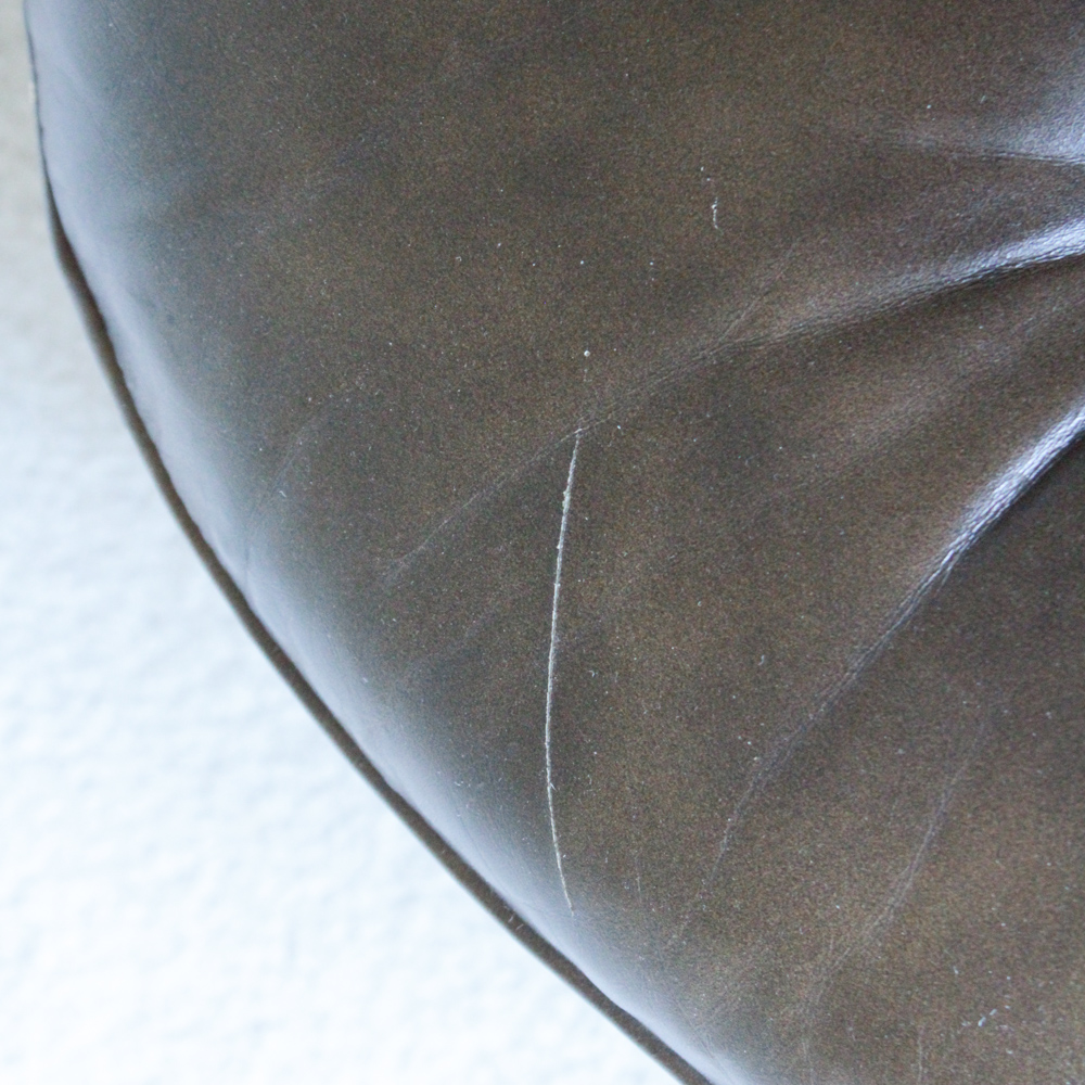 Vintage Tufted Naugahyde Arm Chair and Ottoman