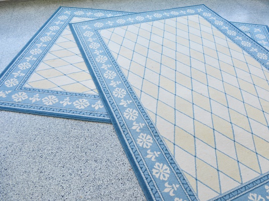 Two Shaw Industries Machine Made Area Rugs