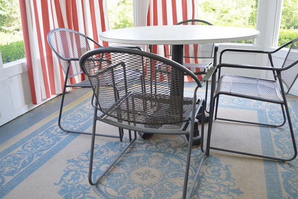 Laminate and Metal Round Table and Four Metal Chairs