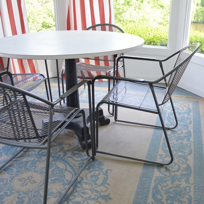 Laminate and Metal Round Table and Four Metal Chairs