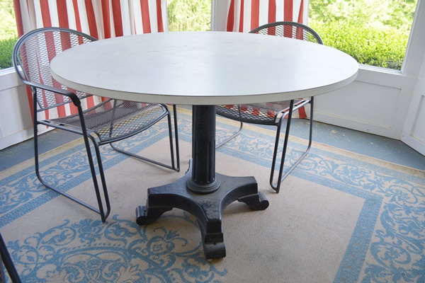 Laminate and Metal Round Table and Four Metal Chairs